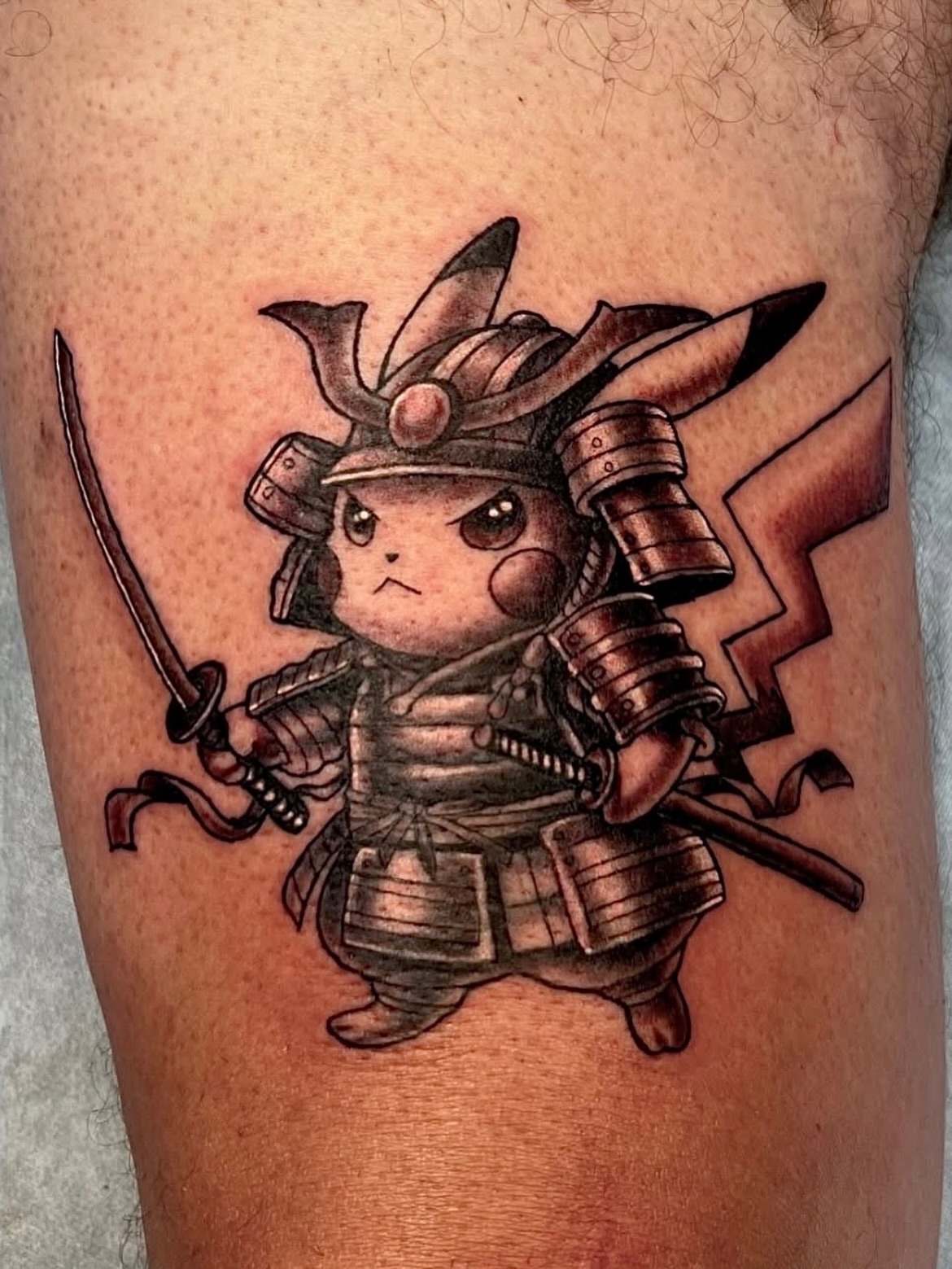 Pikachu samurai dotwork tattoo on the thigh by Nikki Malfitano