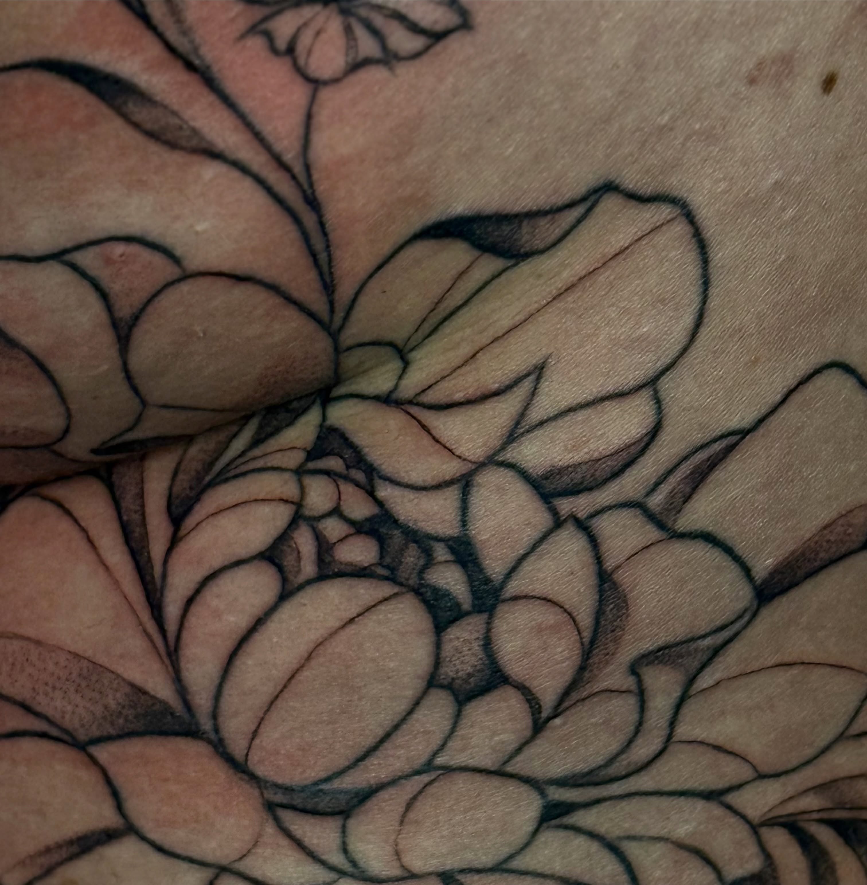 Lotus flower black and grey tattoo on the torso by ๐๐ญ๐ฆ๐จ๐ณ๐ข โ๐๐ฆ๐จโ ๐ฆต