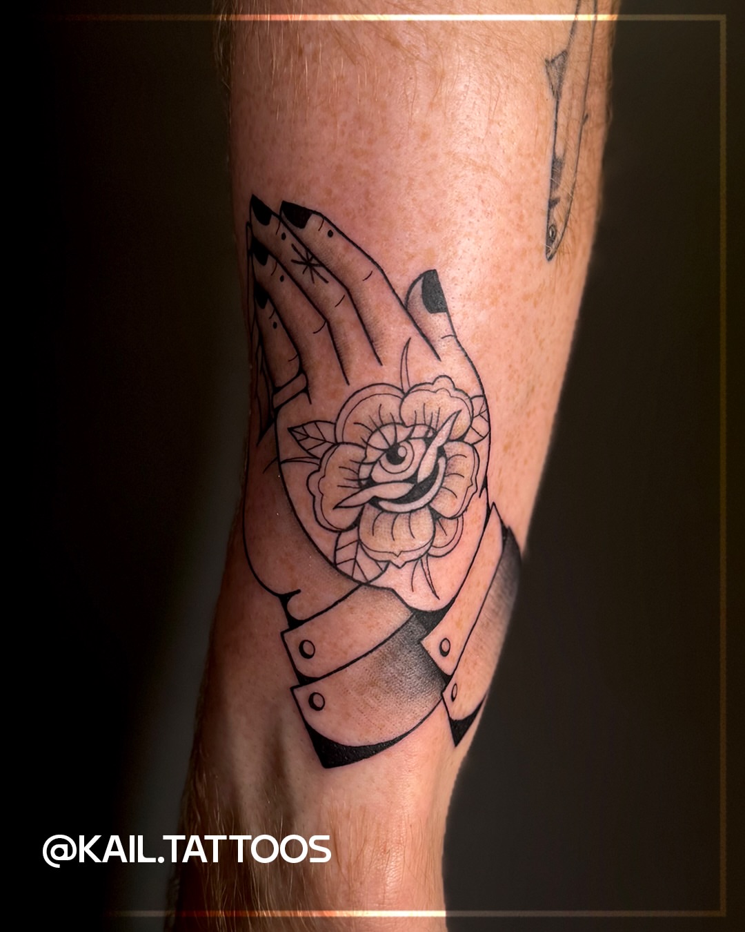Praying hands with flower black and grey tattoo on the forearm by Kail