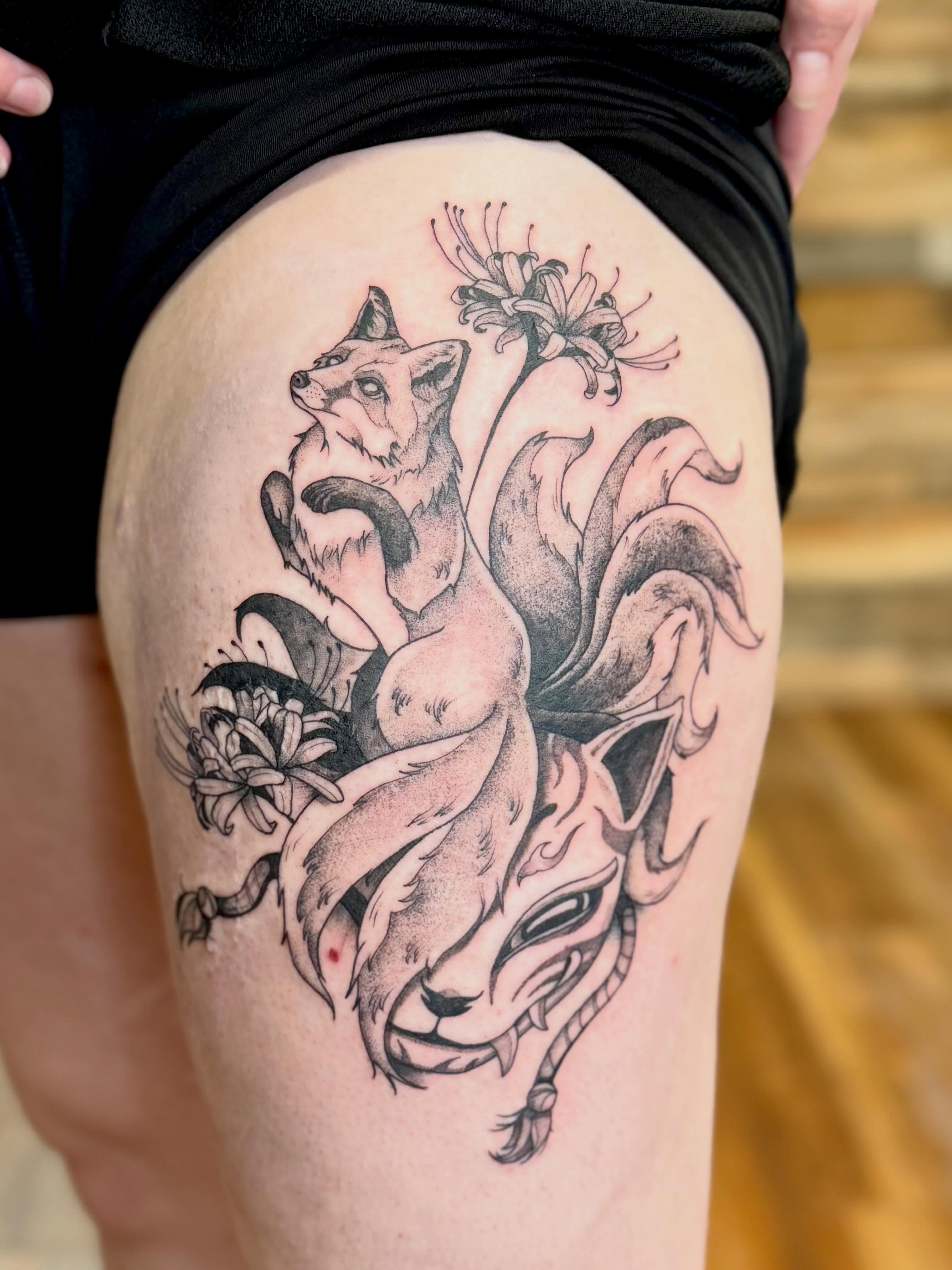 Fox and flowers dotwork tattoo on the thigh by Katie Stacy