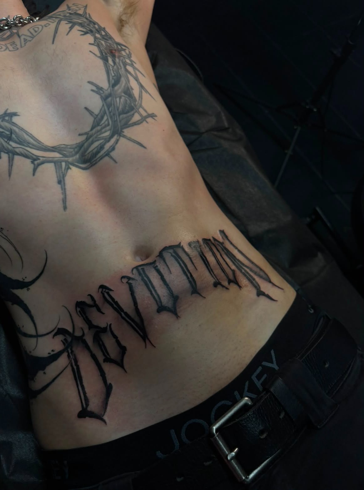 Script lettering lettering script tattoo on the chest by suzie