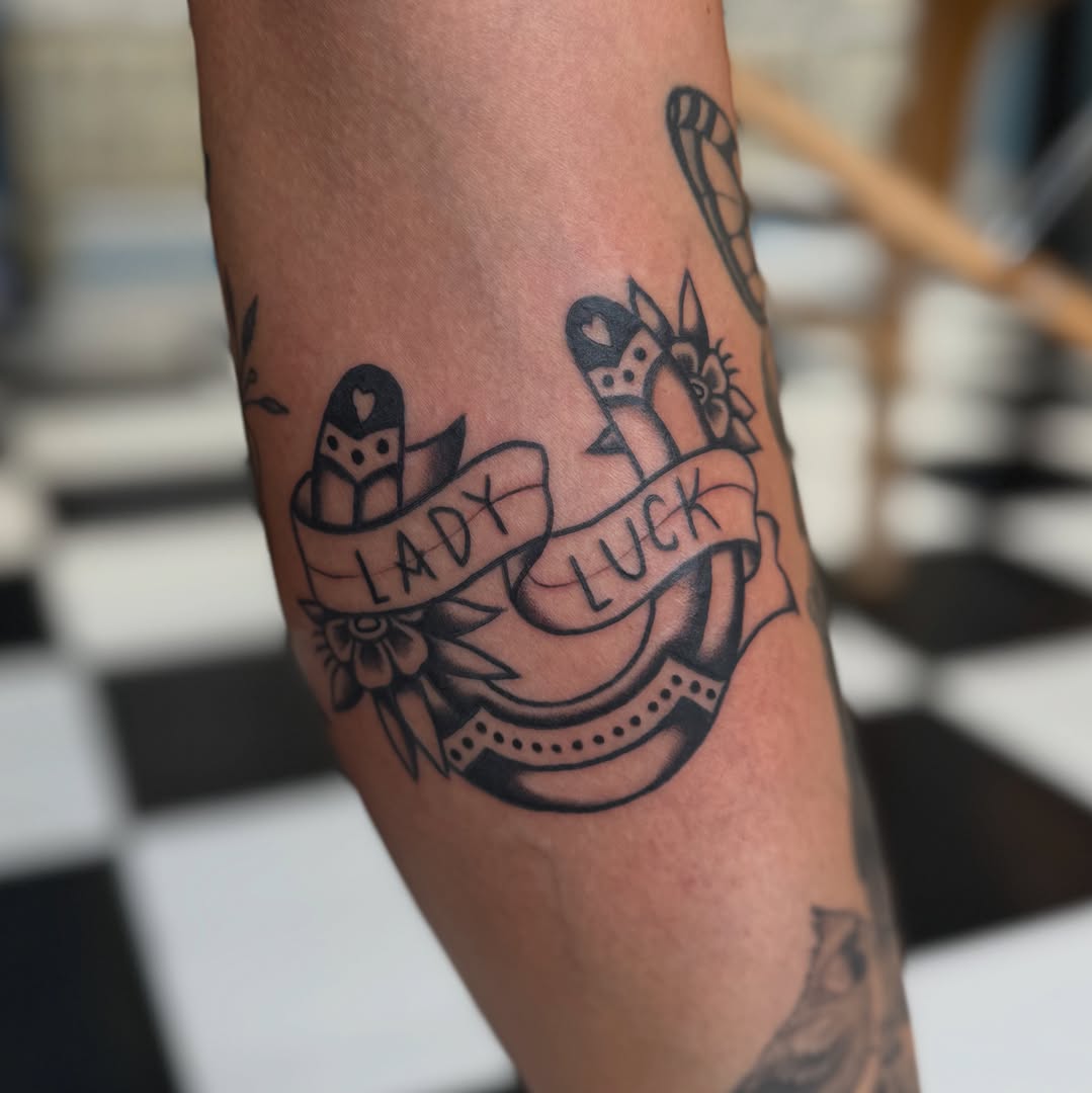 Lady luck American traditional tattoo on the forearm by Béle Benard