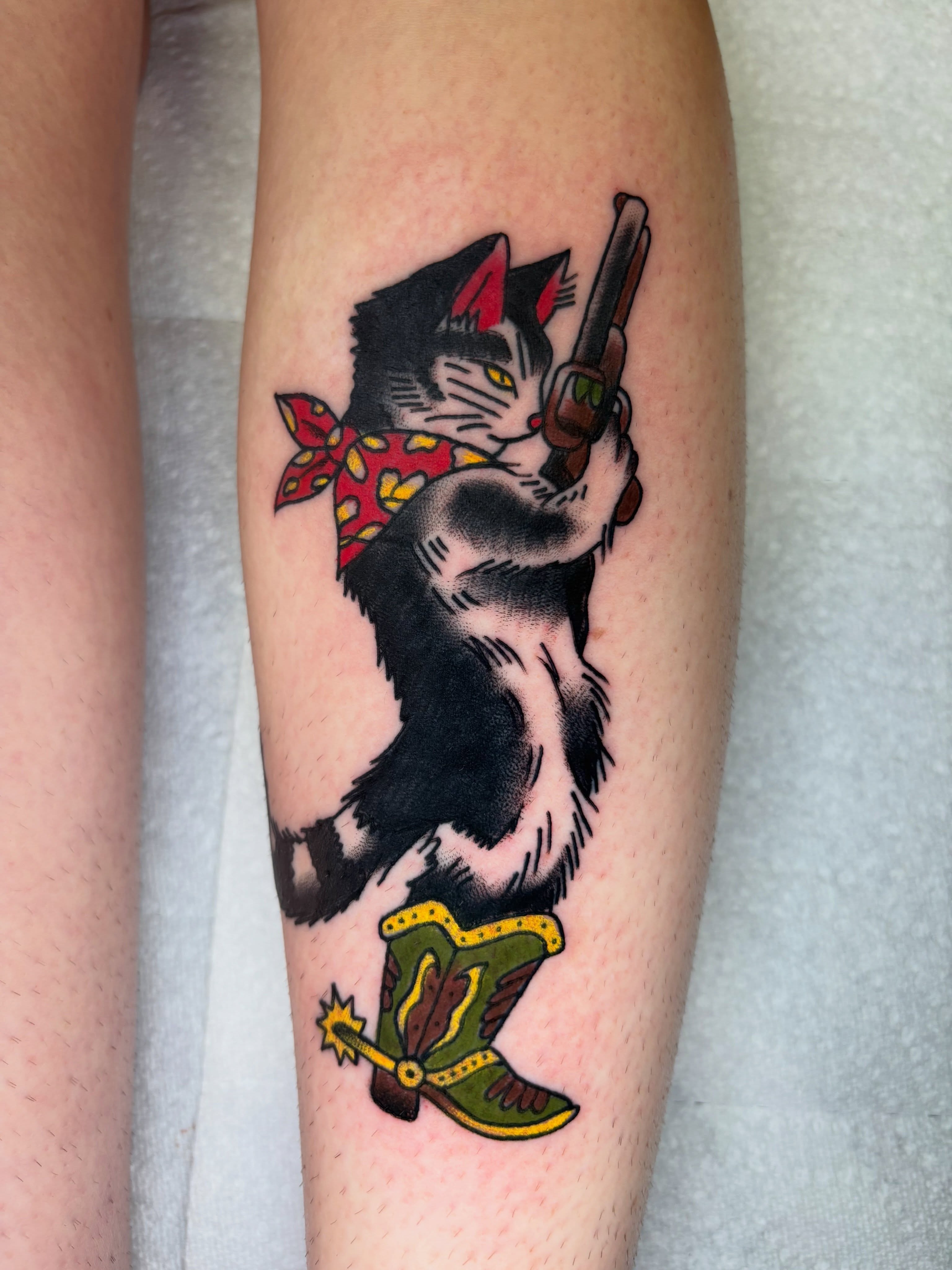 Cat cowboy American traditional tattoo on the forearm by AARON MASTERS - Tattoo Artist