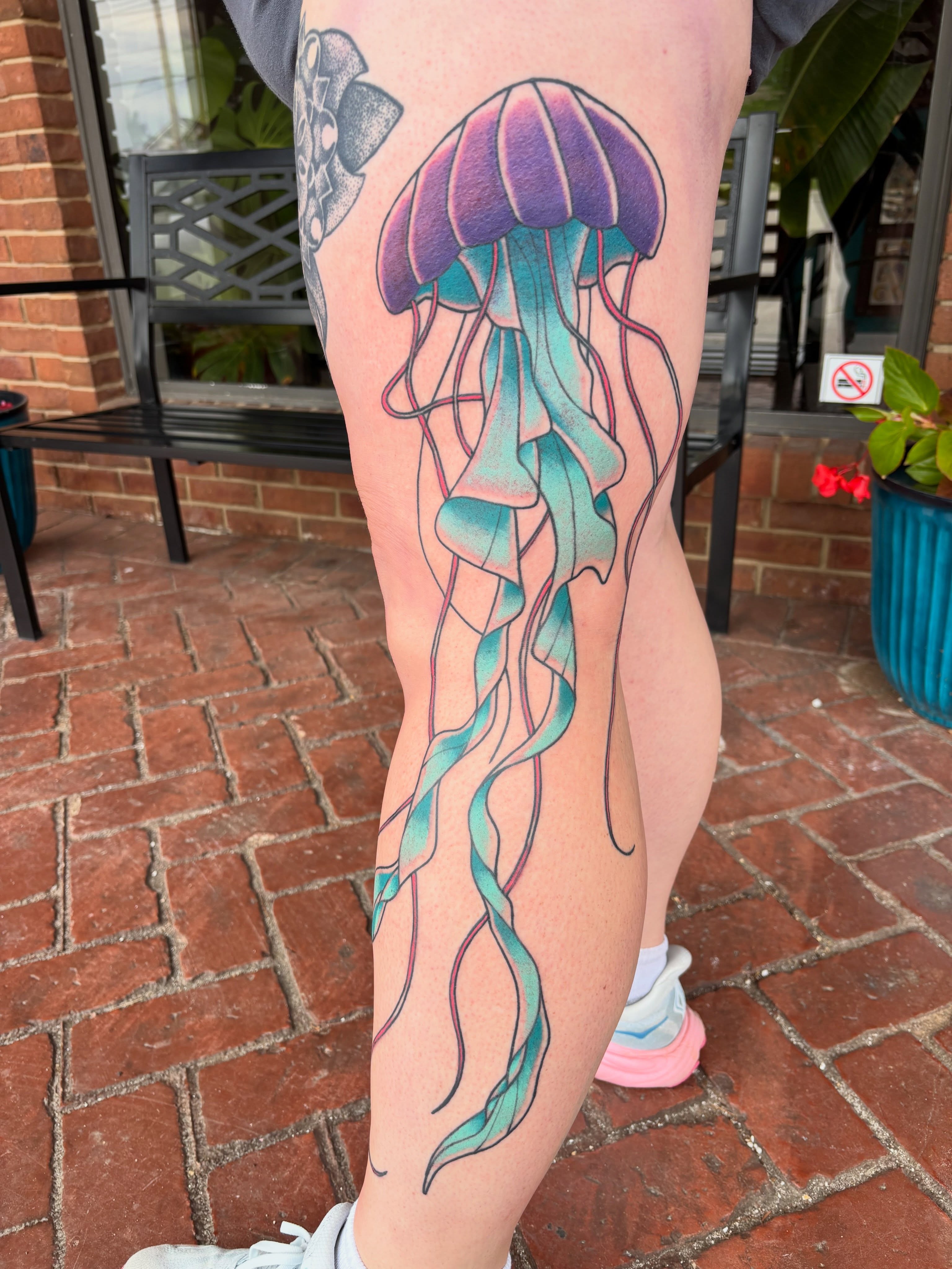 Jellyfish watercolor tattoo on the leg by AARON MASTERS - Tattoo Artist