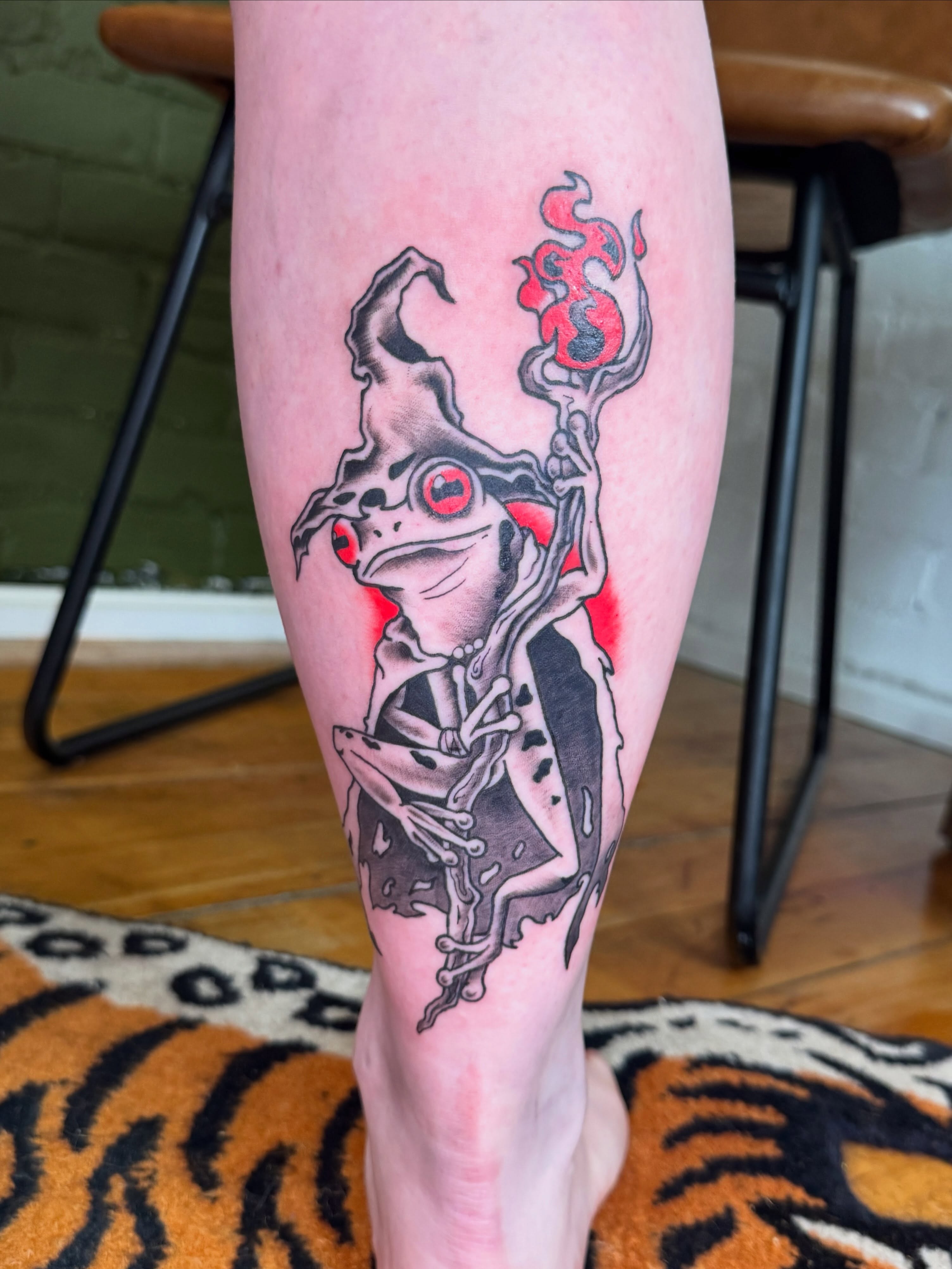 Frog with horns neo-traditional tattoo on the calf by Zac Smith-Chevalier