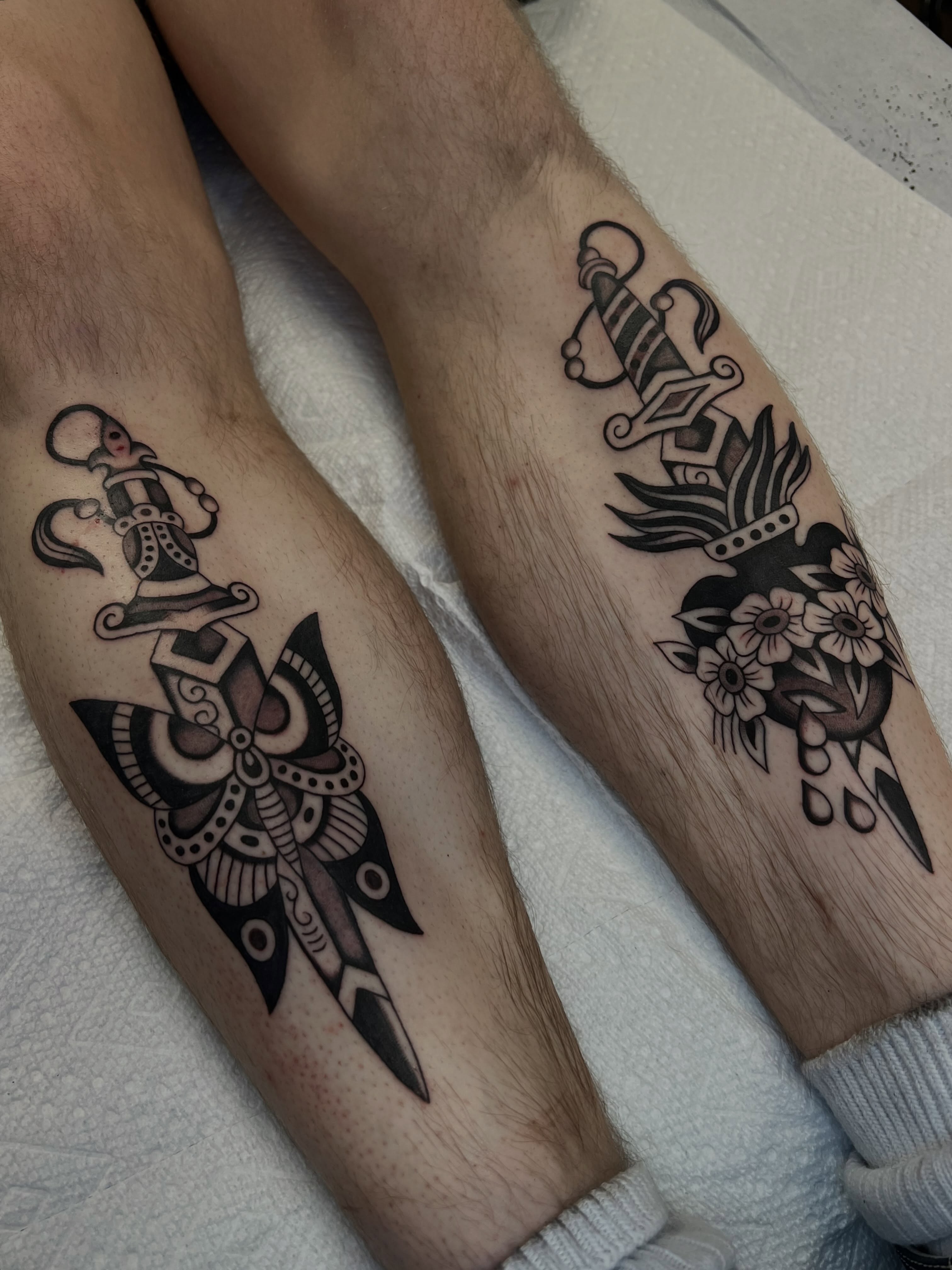 Anchor and dagger American traditional tattoo on the forearm by Syd Sayyah