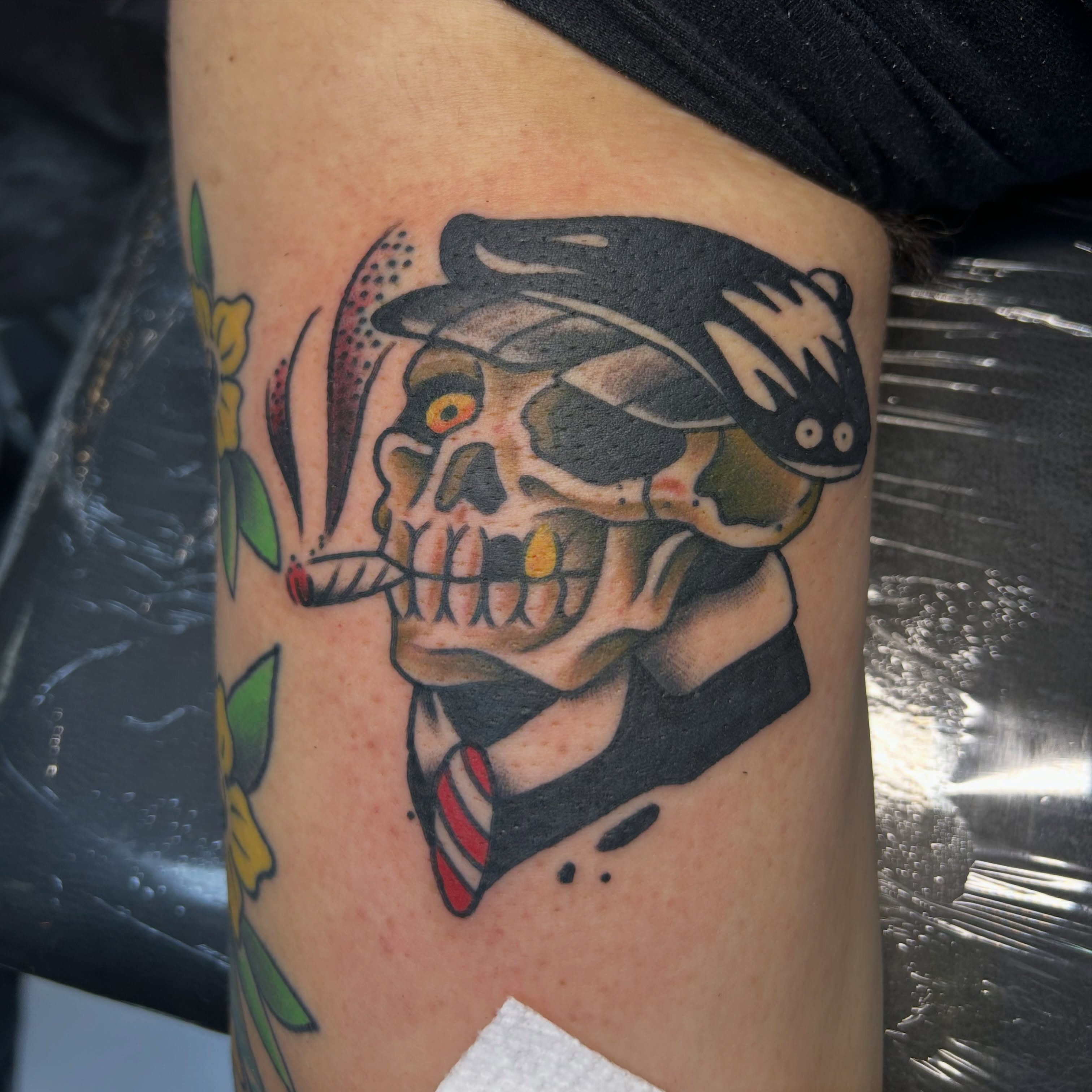 Skull wearing hat American traditional tattoo on the forearm by Tattoos by Corey aka MrLu