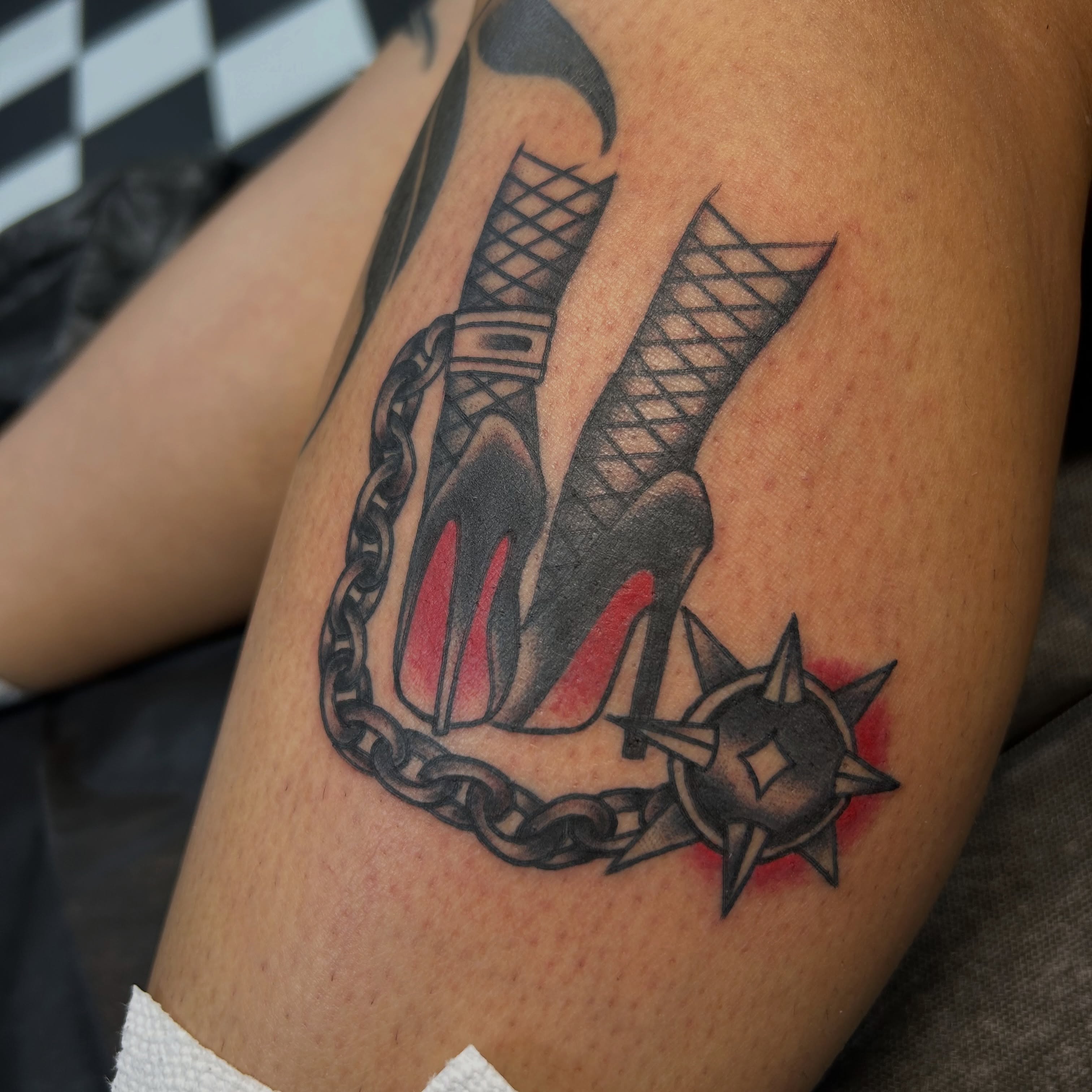High heels and chain black and grey tattoo on the forearm by Tattoos by Corey aka MrLu
