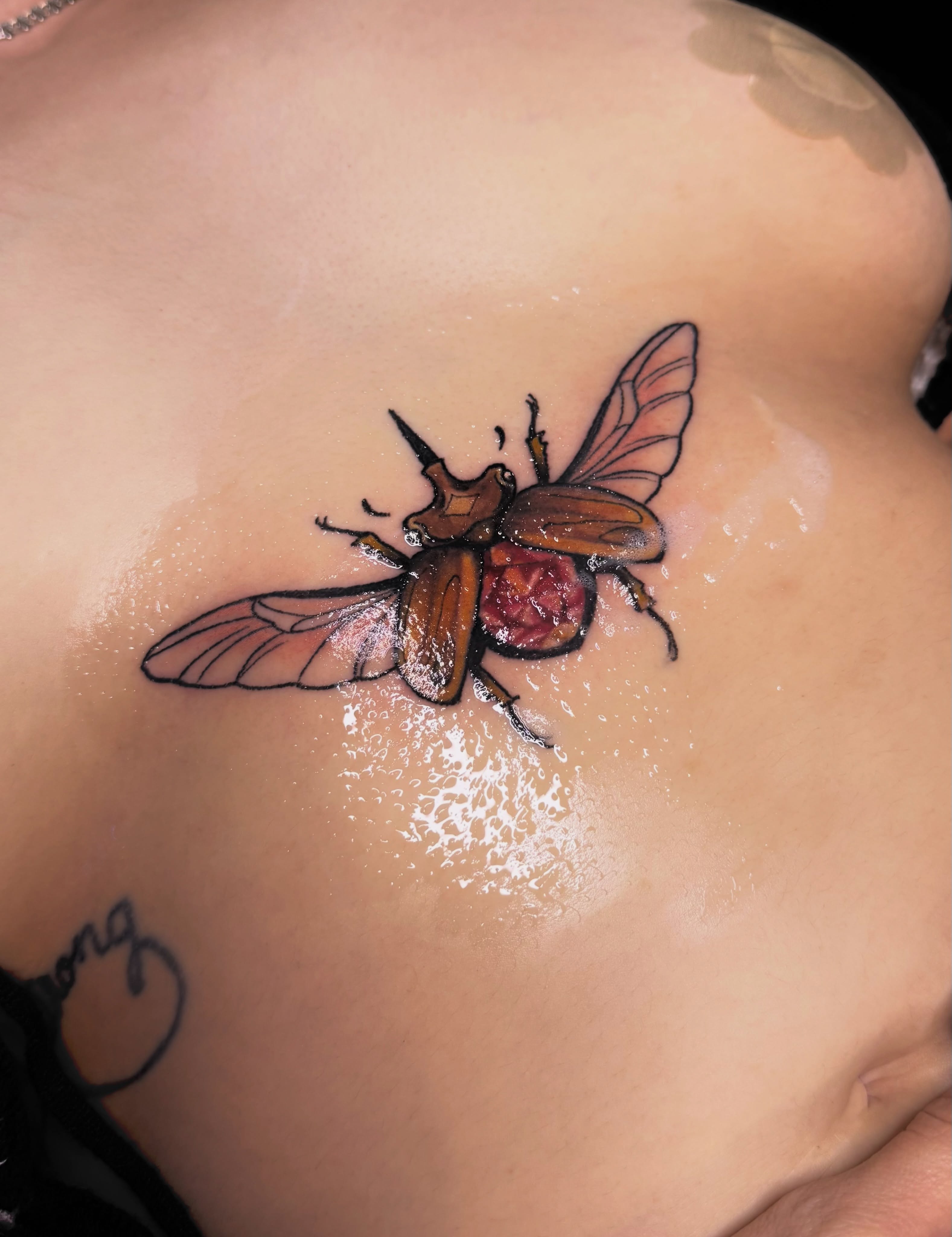 Bee realism tattoo on the chest by Kyndall Lynn, Waxahachie, Texas