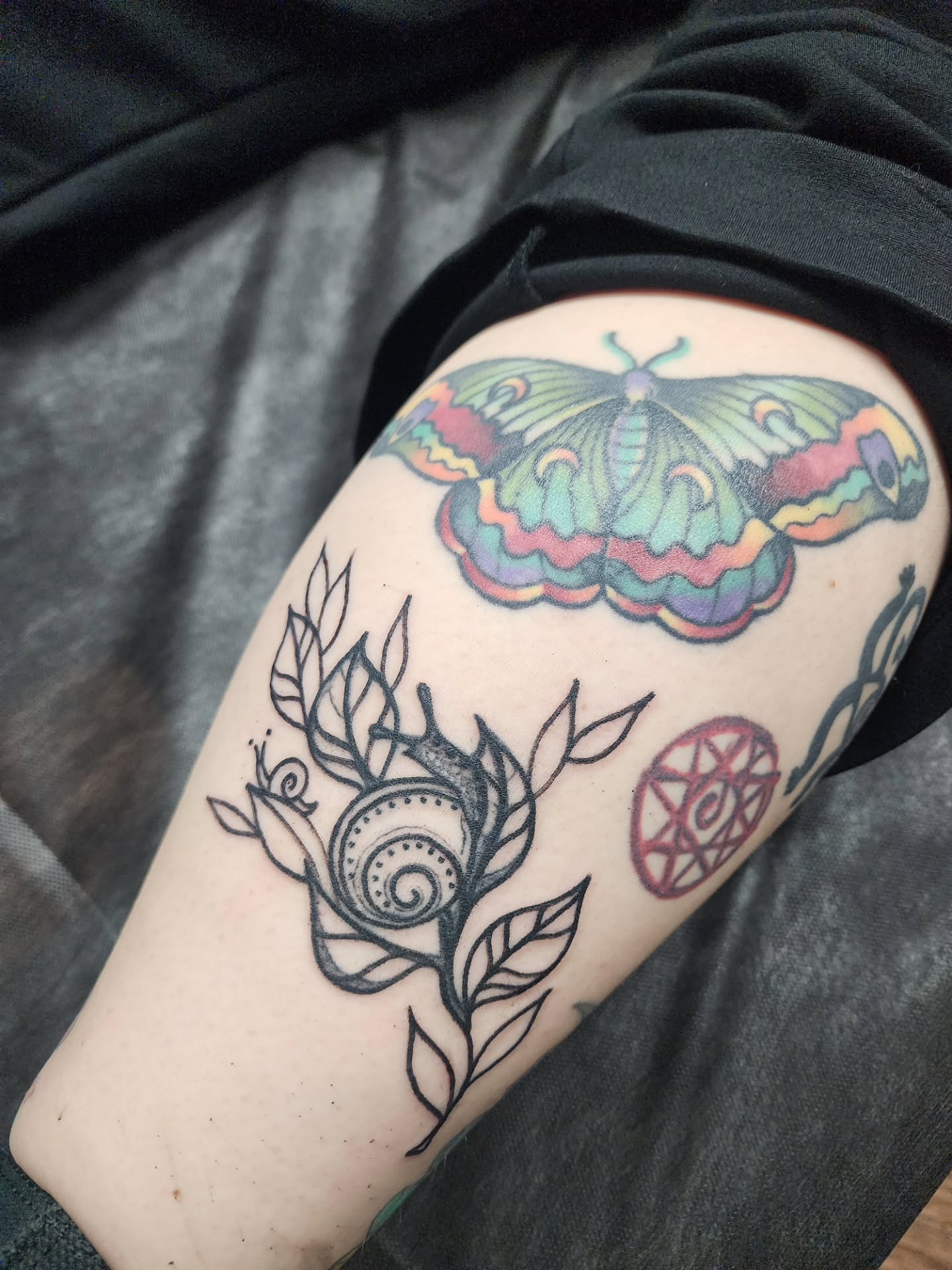 Butterfly and snail new school tattoo on the thigh by Meggalodon 🖤 (Meggan Rose)