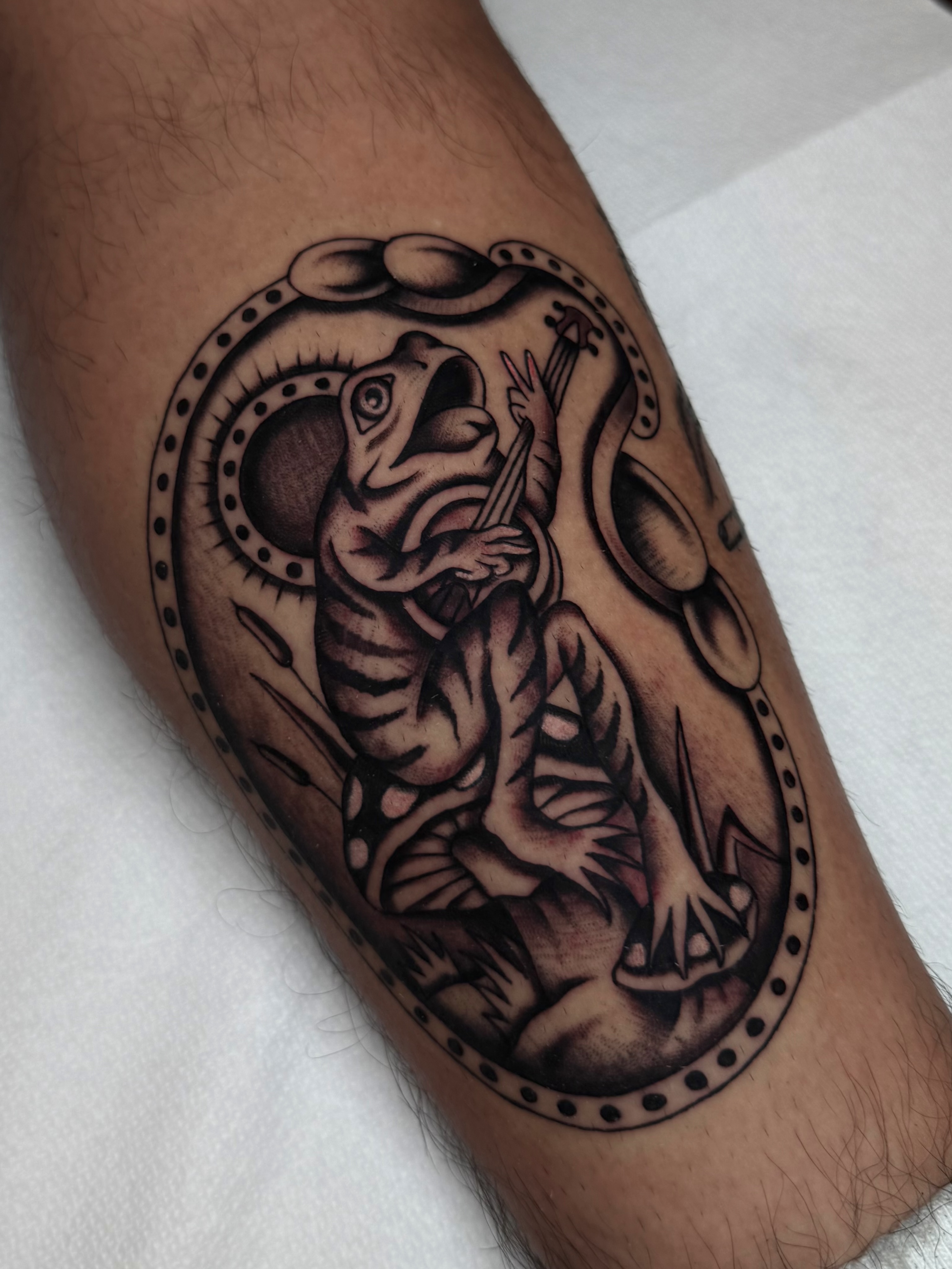 Octopus black and grey tattoo on the forearm by Casey Sullivan, San Diego, California