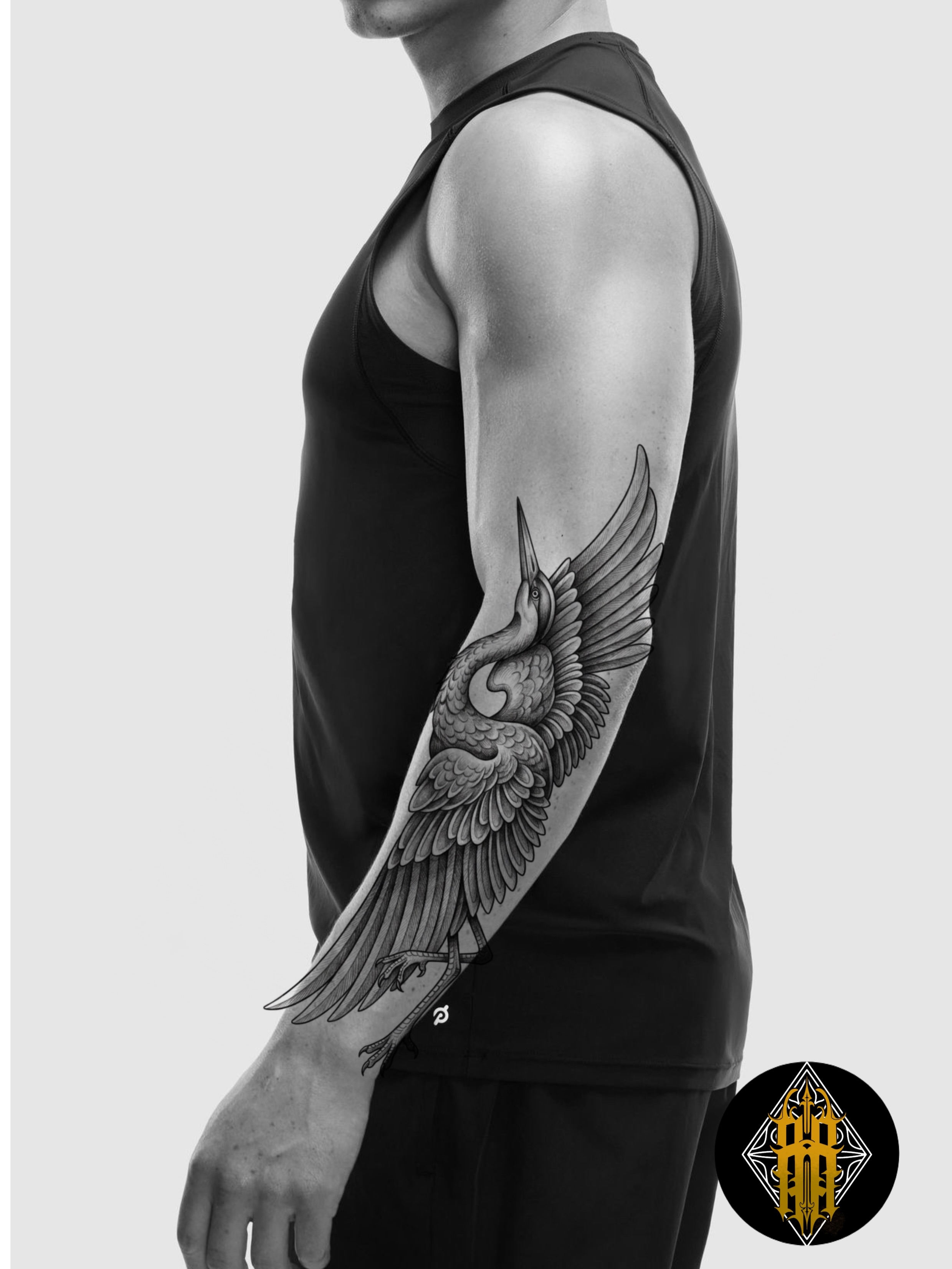 Bird black and grey tattoo on the upper arm by Rafael Alfredo Armas Hoyos, Salt Lake City, Utah