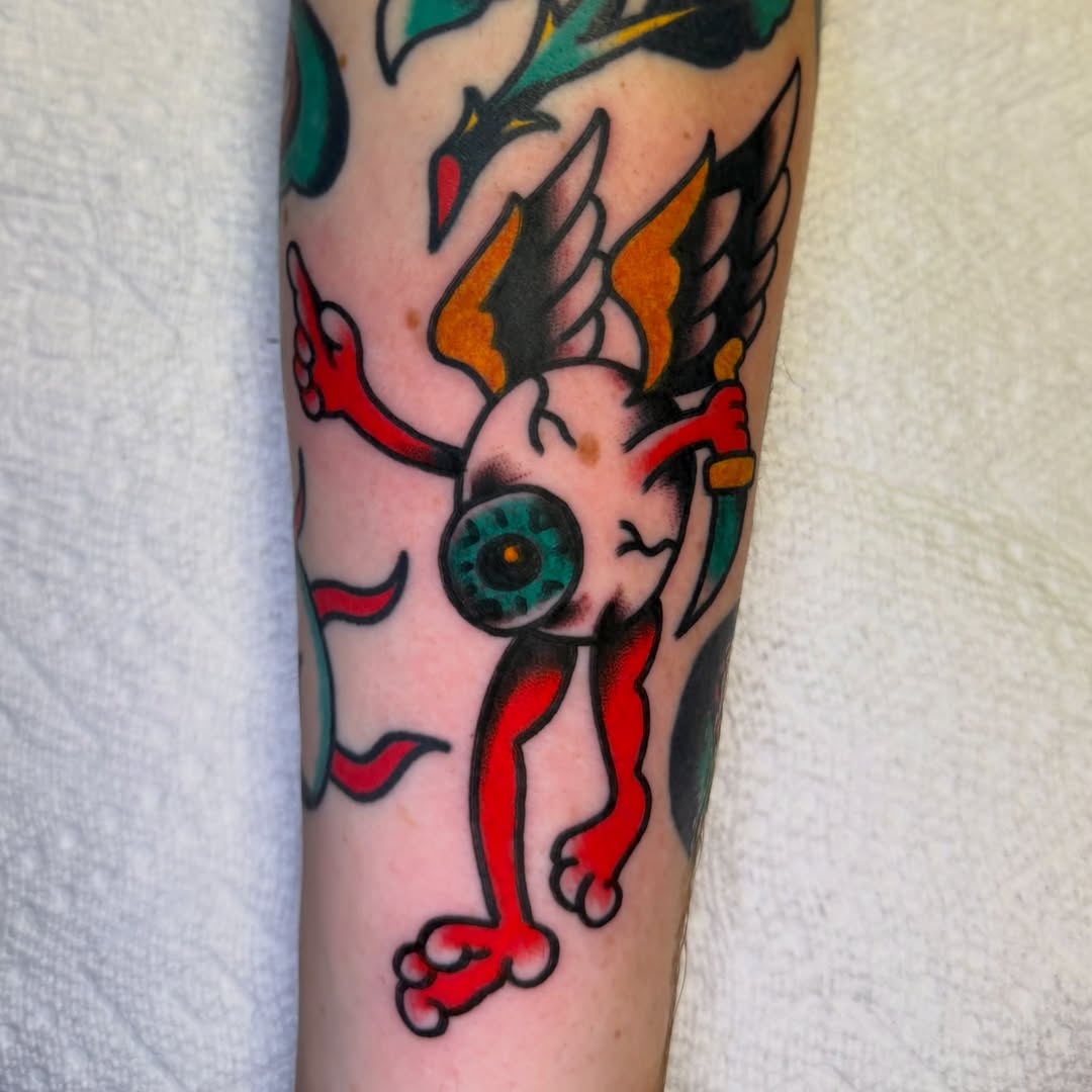 Eye with wings American traditional tattoo on the forearm by Buddy (Holiday) Orr, Las Vegas, Nevada