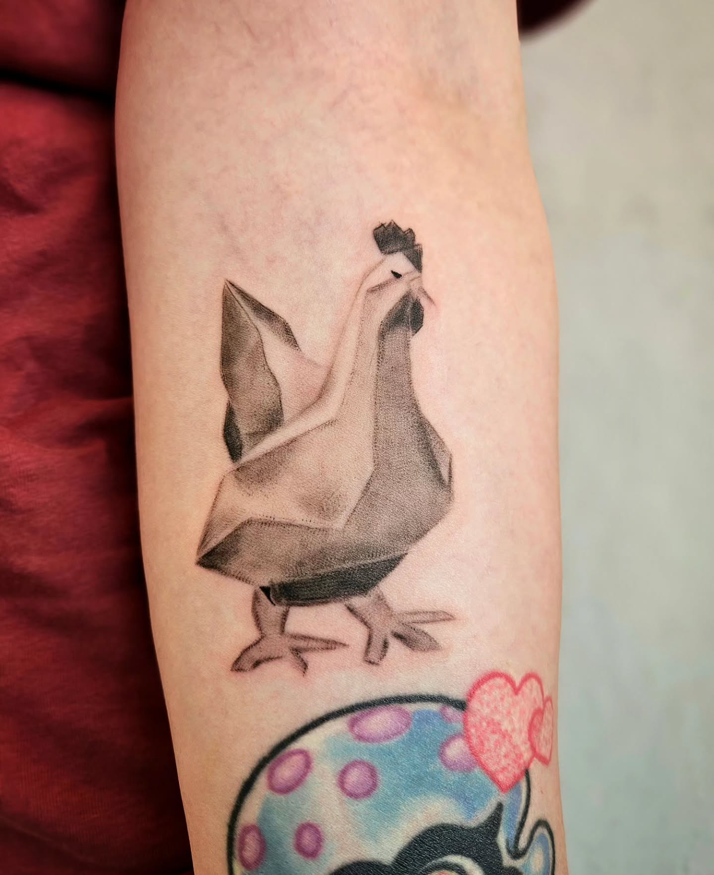 Origami crane geometric tattoo on the forearm by Lina ๐ป