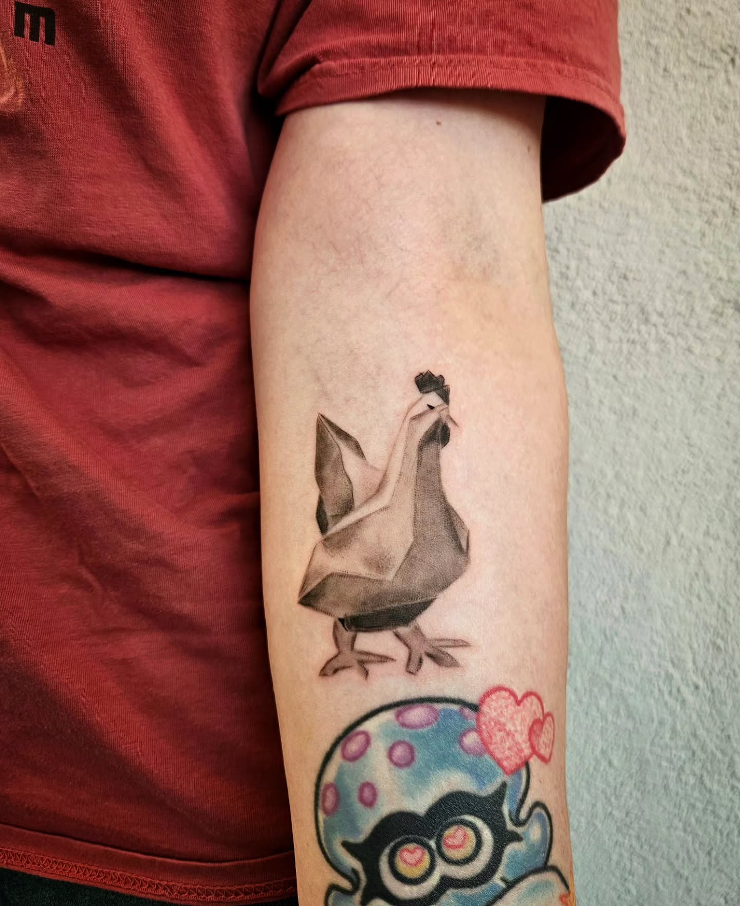 Origami bird geometric tattoo on the forearm by Lina ๐ป