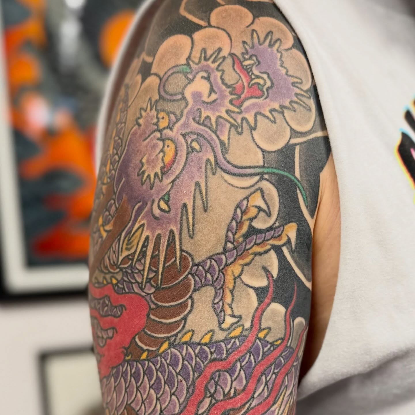 Dragon japanese irezumi tattoo on the upper arm by Jason Eisenberg
