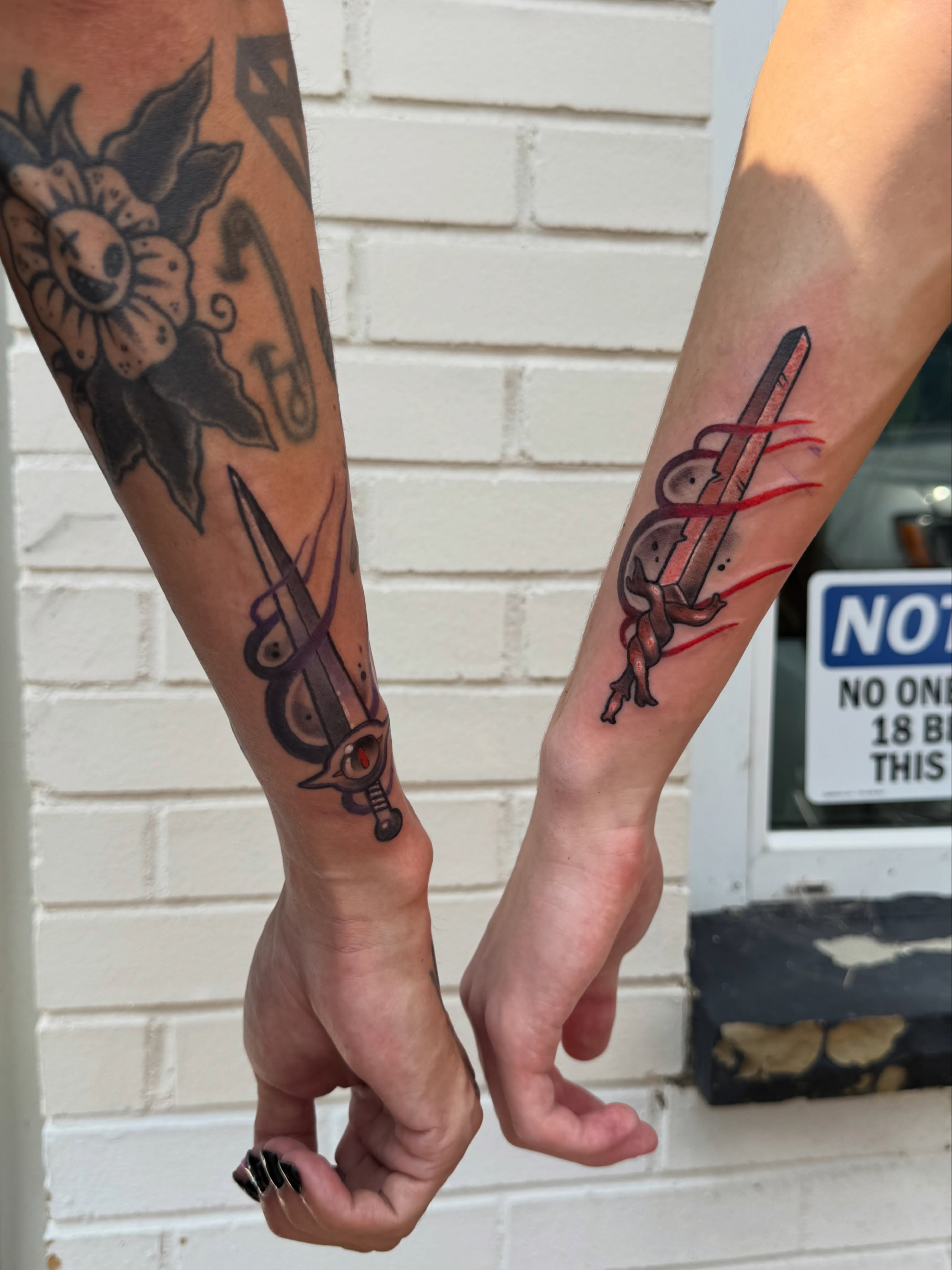 Sword and ribbon American traditional tattoo on the forearm by Tattoos by Angel Lee