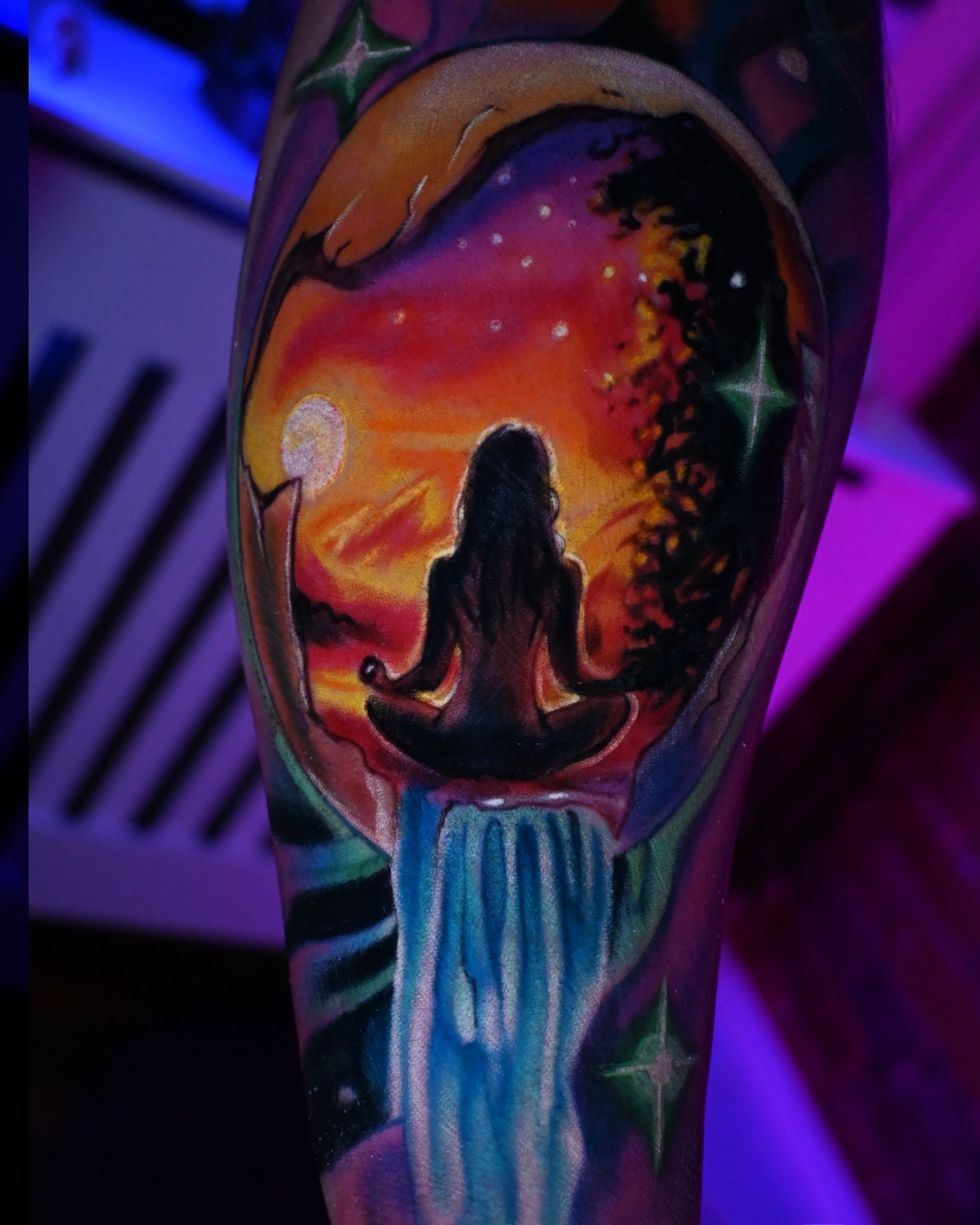 Meditation scene illustrative tattoo on the forearm by William Pollock