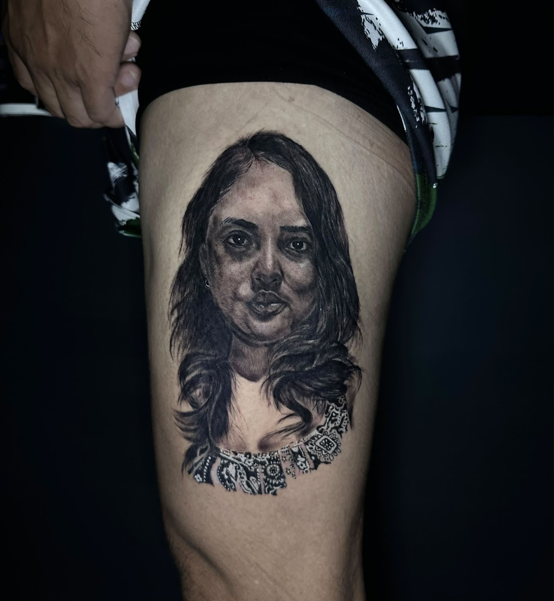 Portrait realism tattoo on the thigh by Stephen Degracia