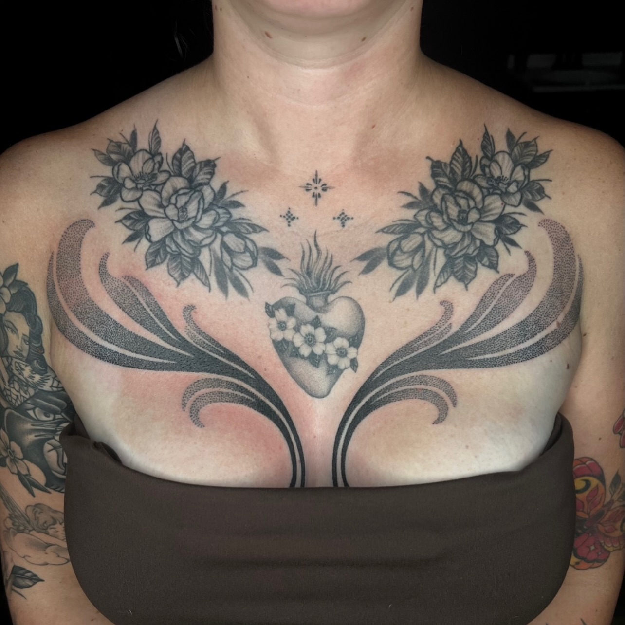 Heart with flowers dotwork tattoo on the chest by 𝔐𝔦𝔠𝔥𝔢𝔩𝔩𝔢 ℭ𝔥𝔞𝔪𝔢𝔯𝔩𝔦𝔨