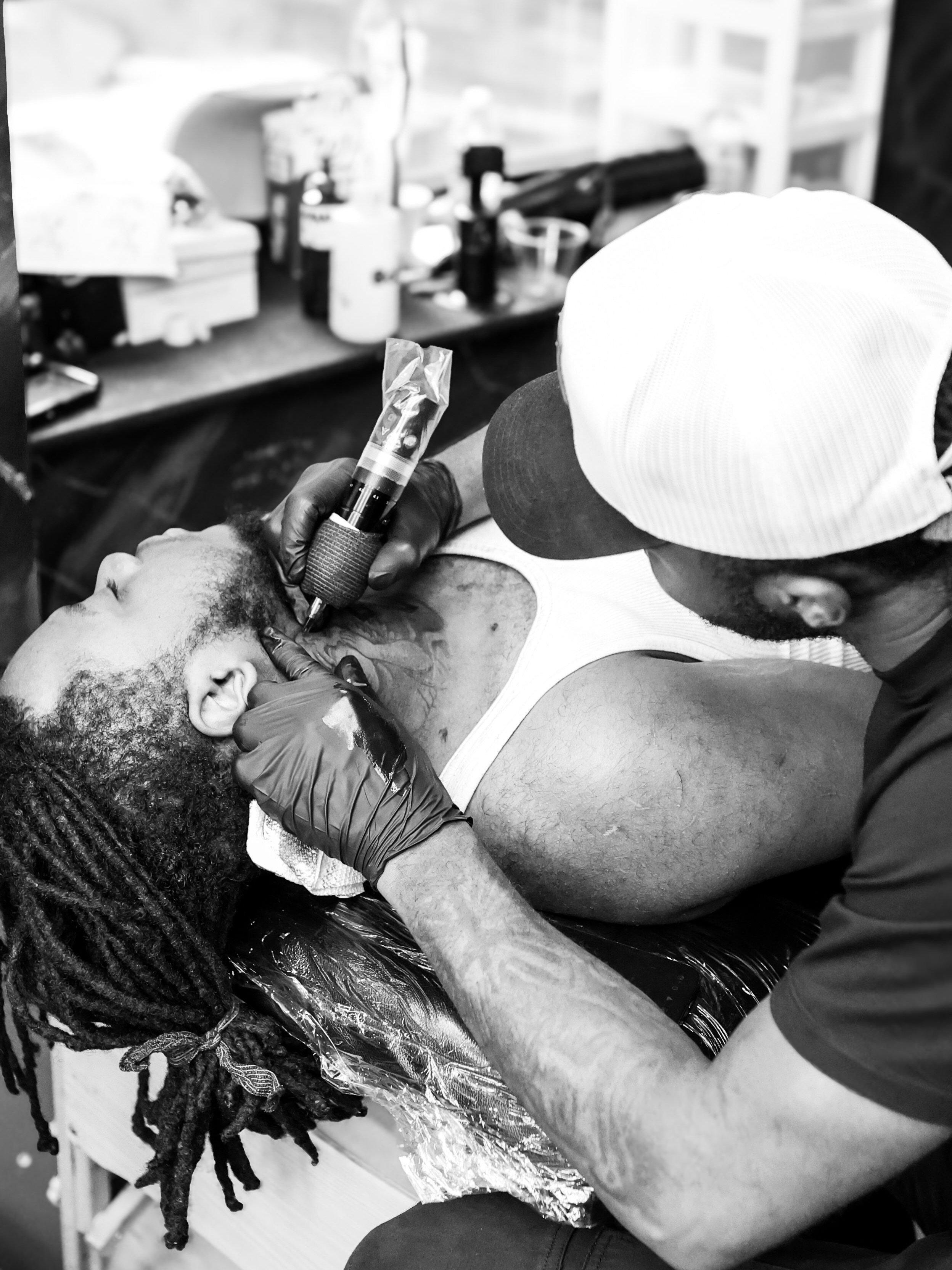 Beard grooming black and grey tattoo on the head by Left My Mark