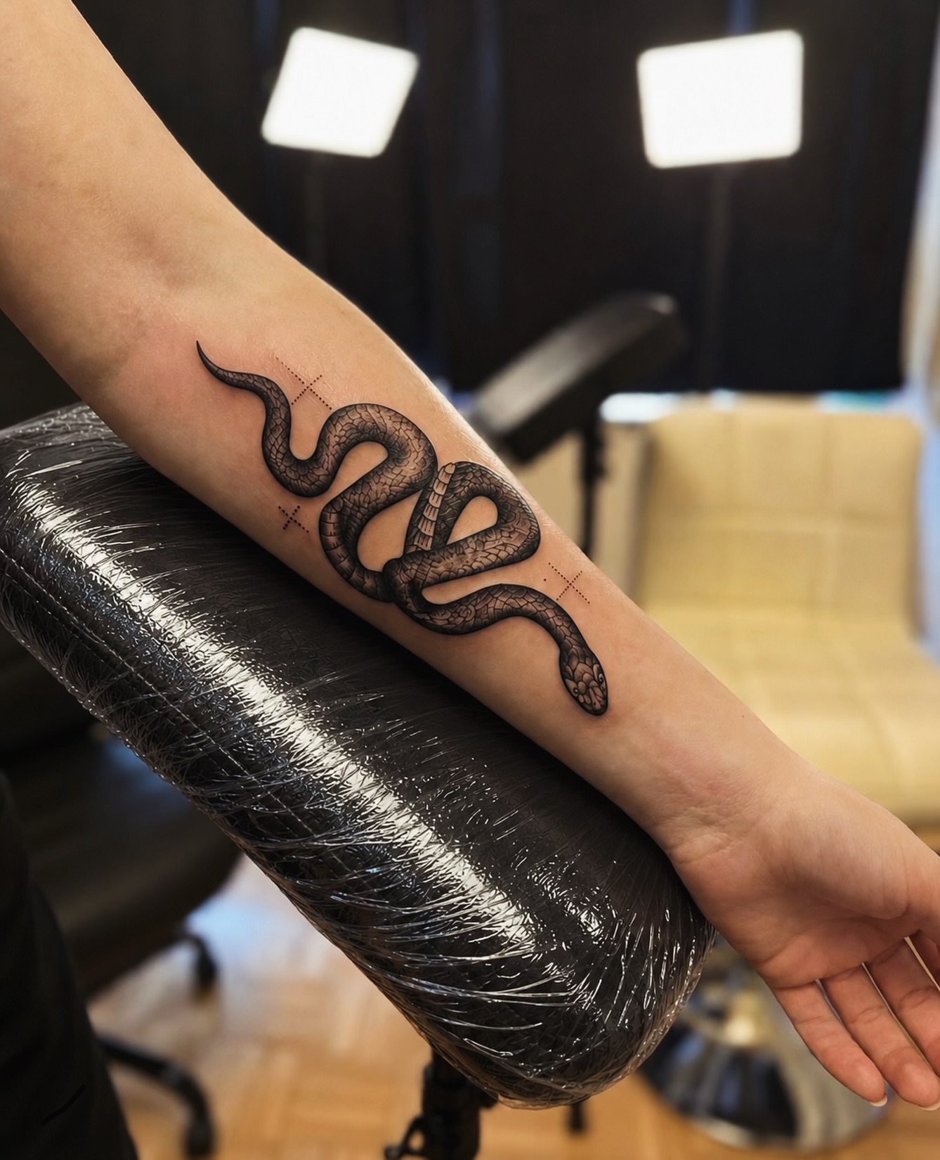 Snake realism tattoo on the forearm by I N K S L A y e R