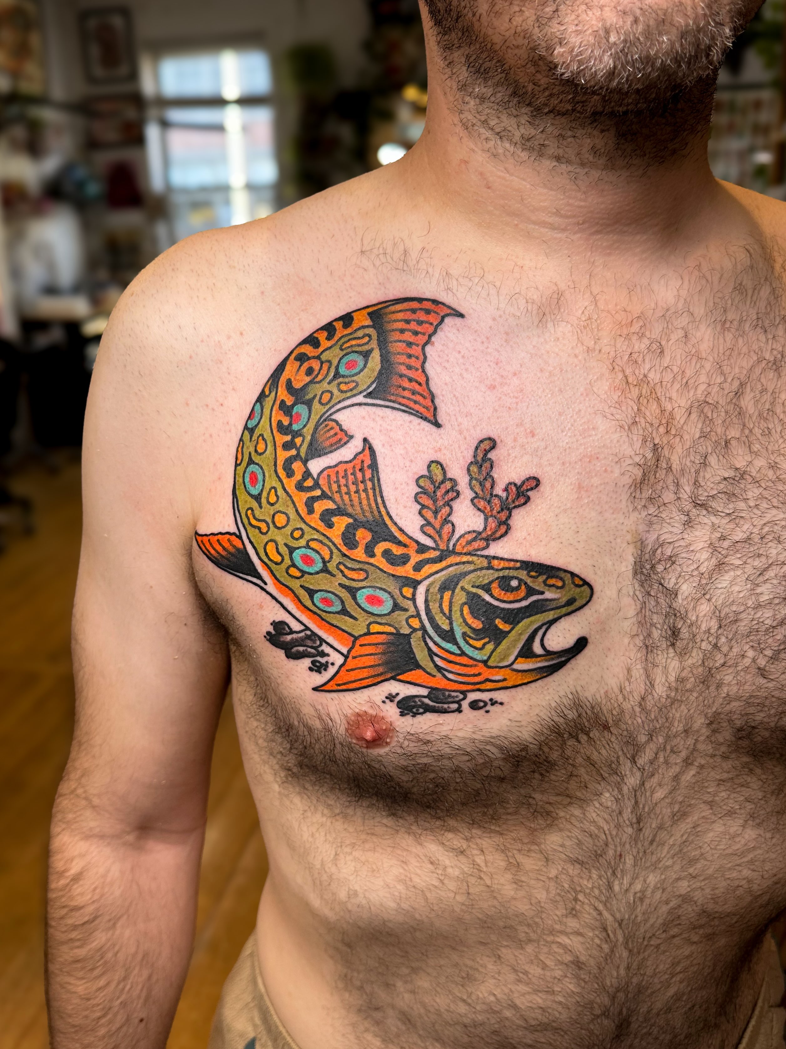 Fish new school tattoo on the chest by Danny Reed, Asheville, North Carolina