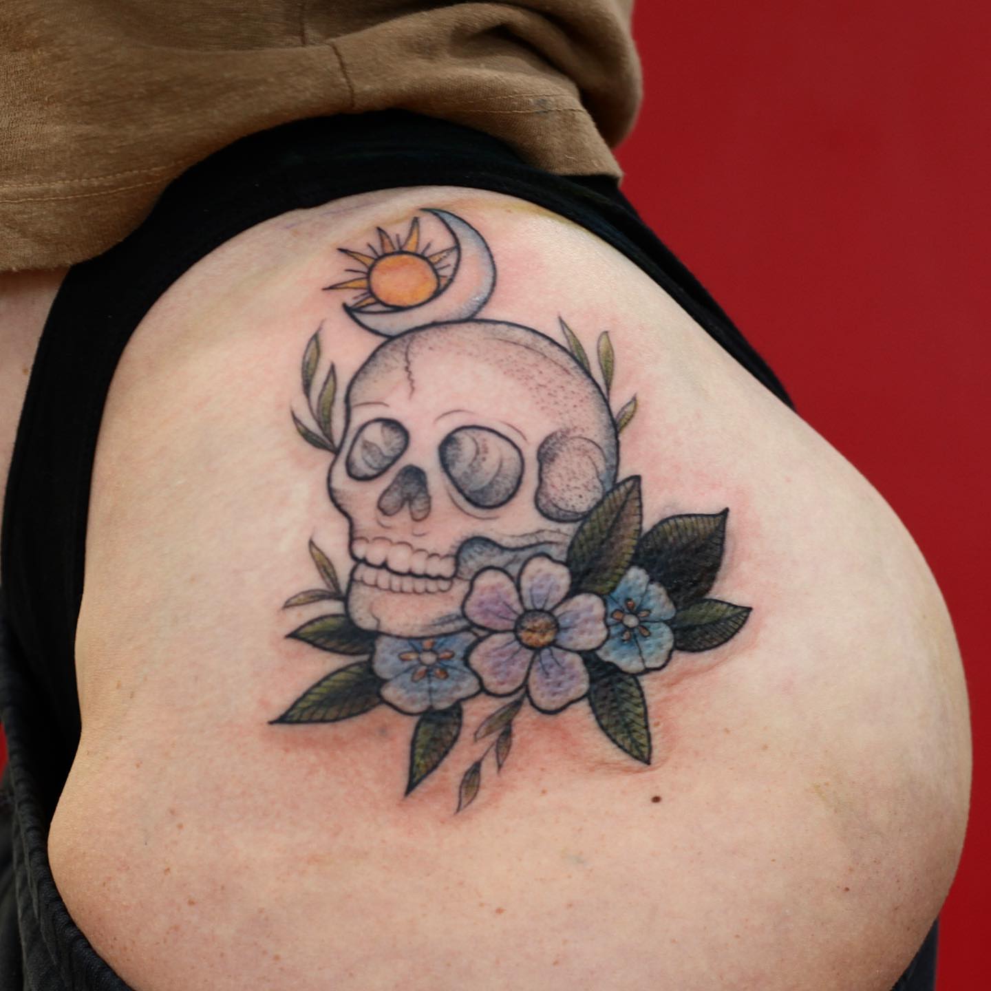 Skull with flowers realism tattoo on the shoulder by adrienne mae ❀