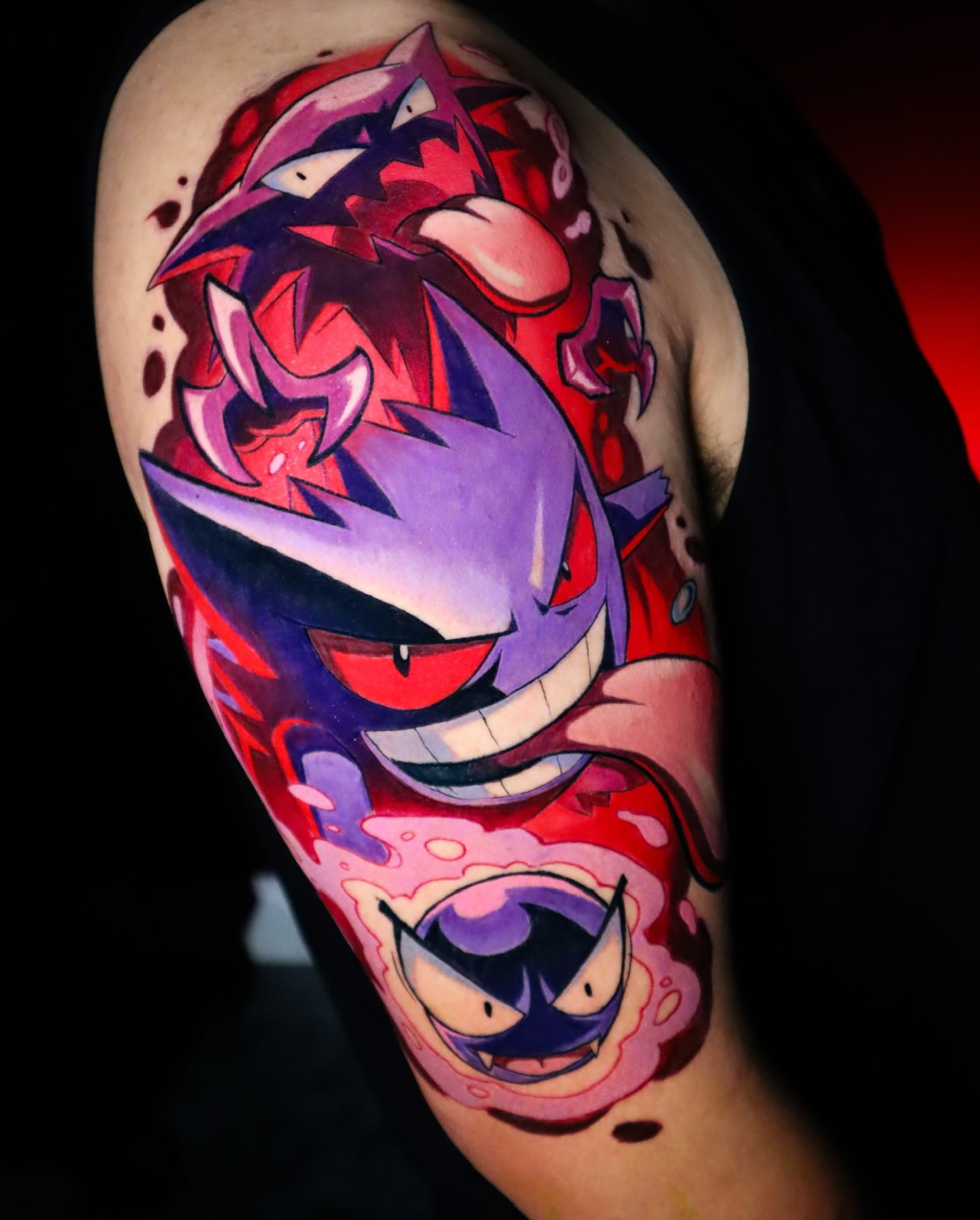 Angry cat anime tattoo on the upper arm by Jesús Blones - Tattoo Artist, Norwalk, Connecticut