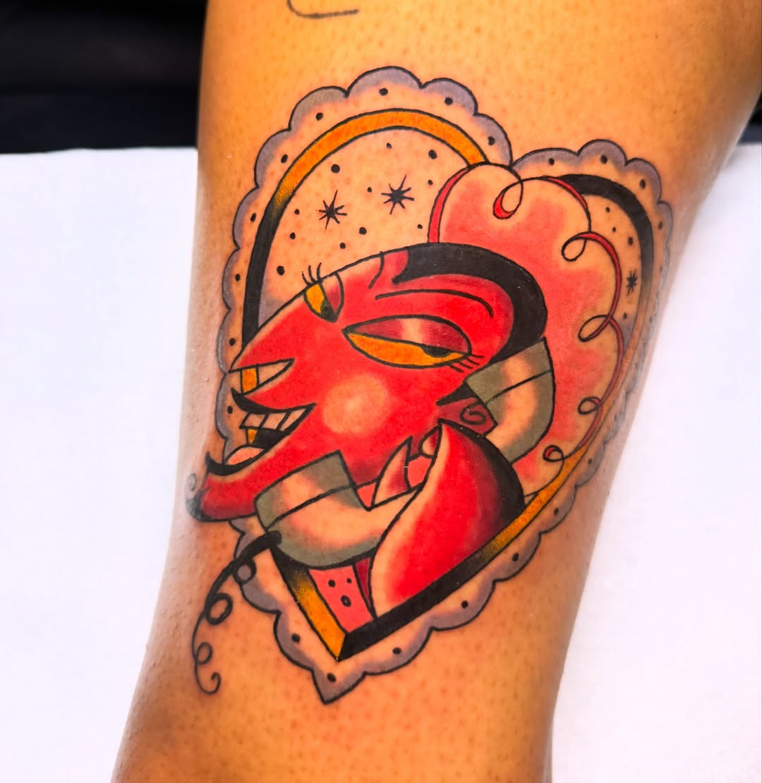 Heart with dragon American traditional tattoo on the forearm by Shelby