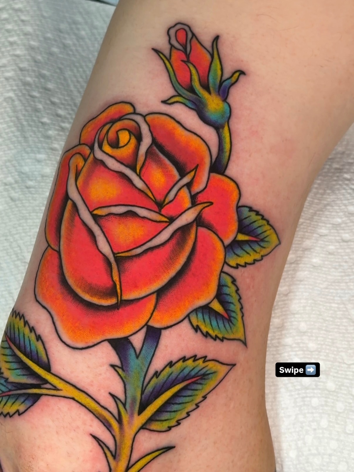 Rose American traditional tattoo on the forearm by Randy Conner, Portland, Oregon