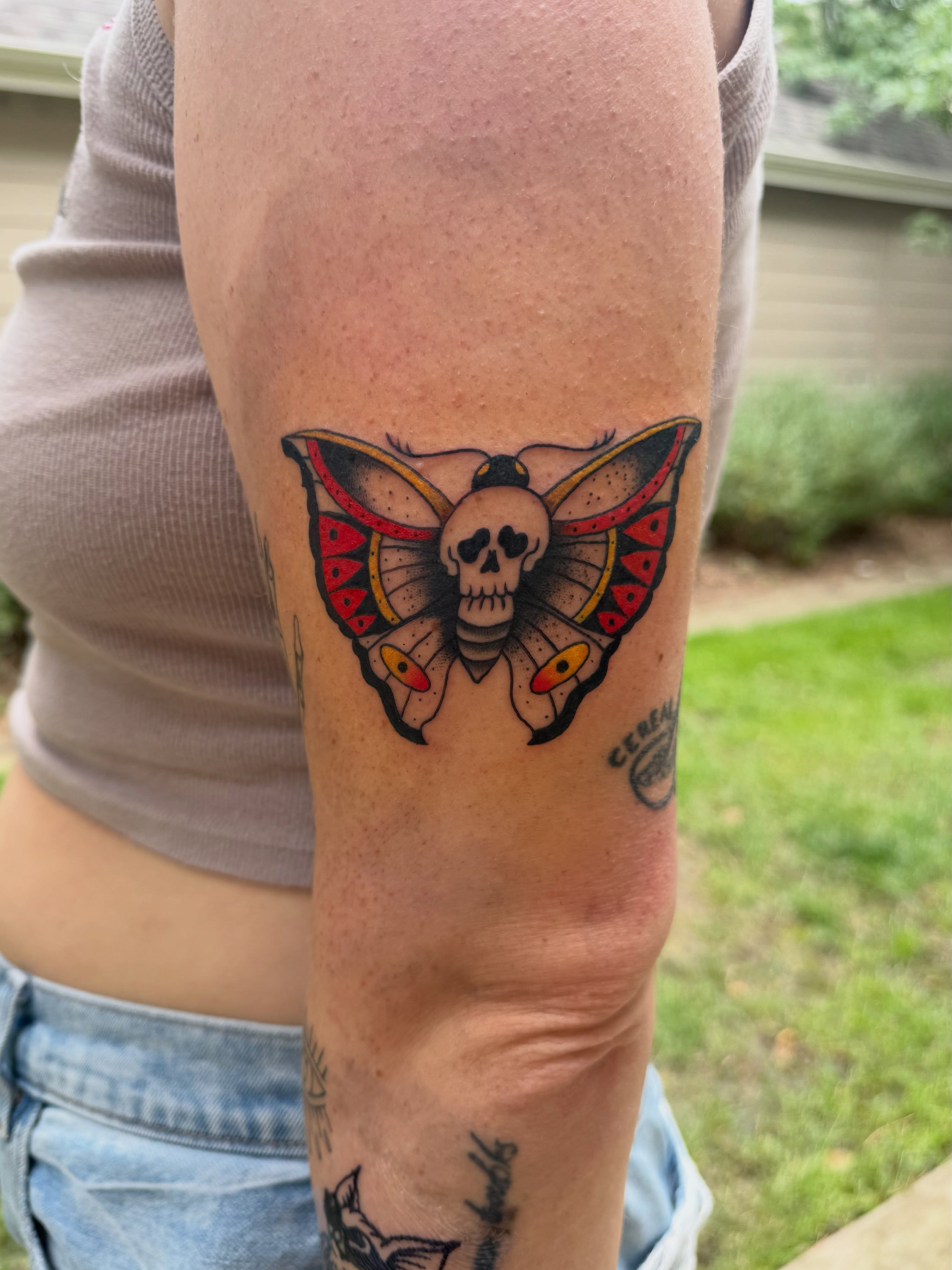 Skull moth American traditional tattoo on the forearm by Palmer Andrist🩸Fort Collins Tattoo Apprentice
