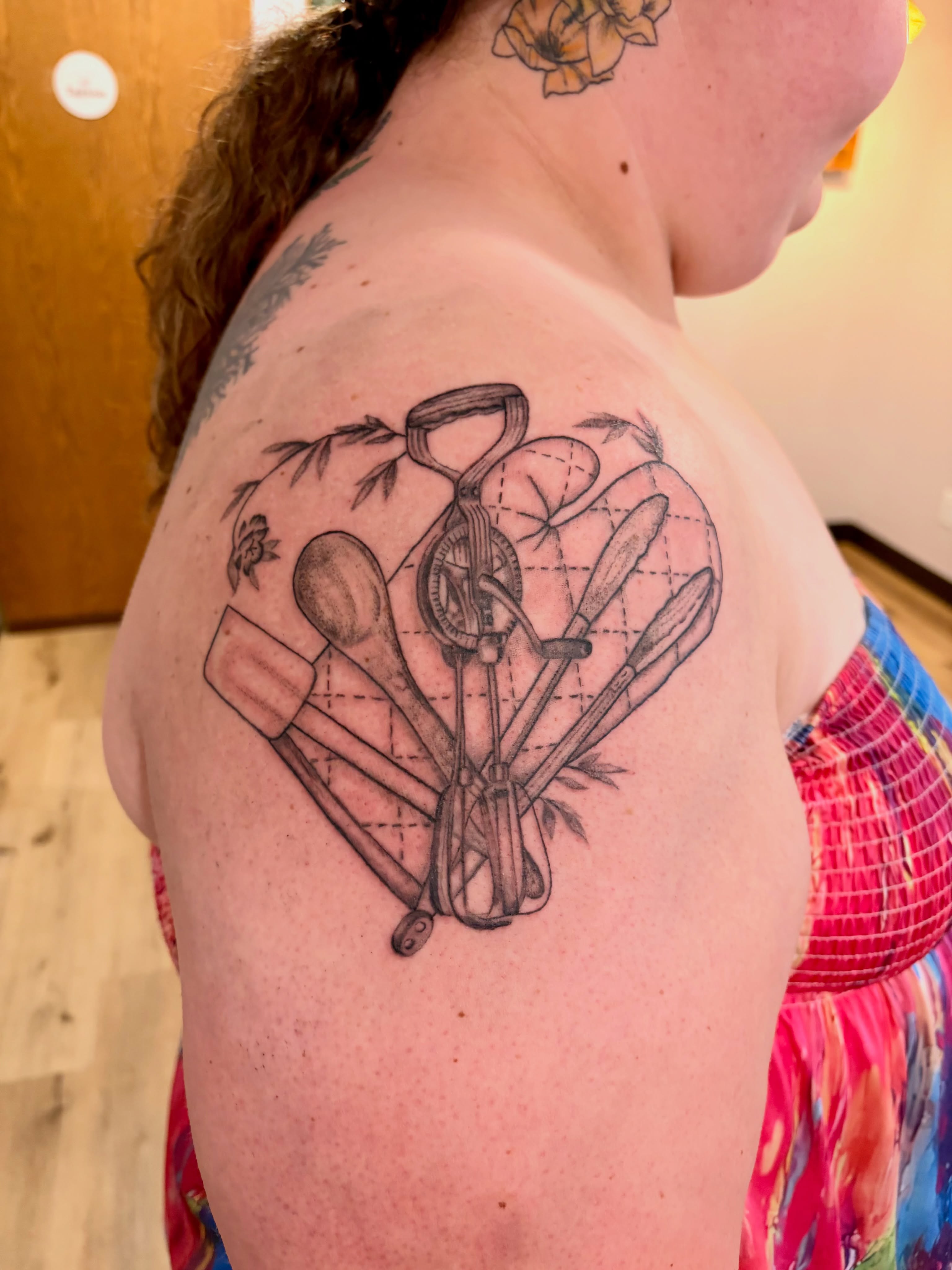 Kitchen utensils black and grey tattoo on the shoulder by Emily, Monticello, Iowa