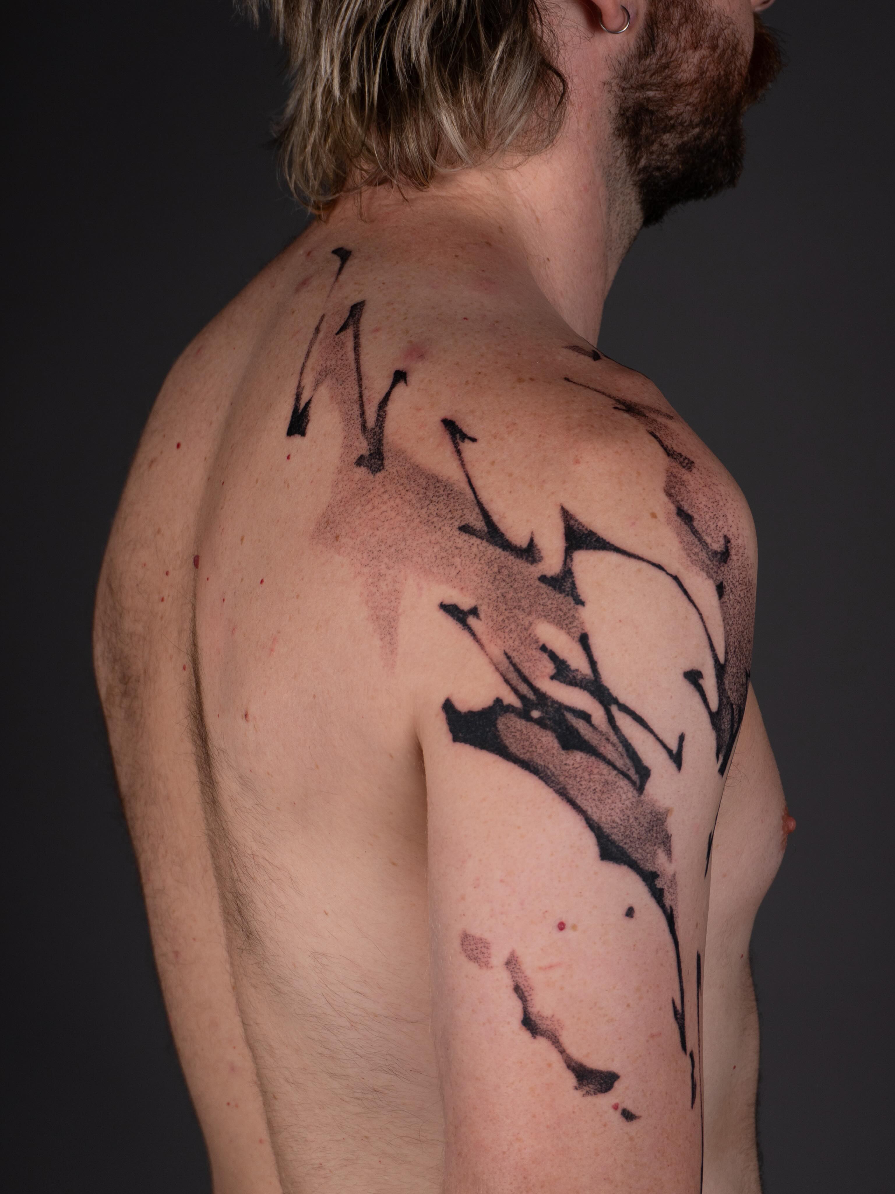 Abstract branches dotwork tattoo on the back by Pietro Moleti