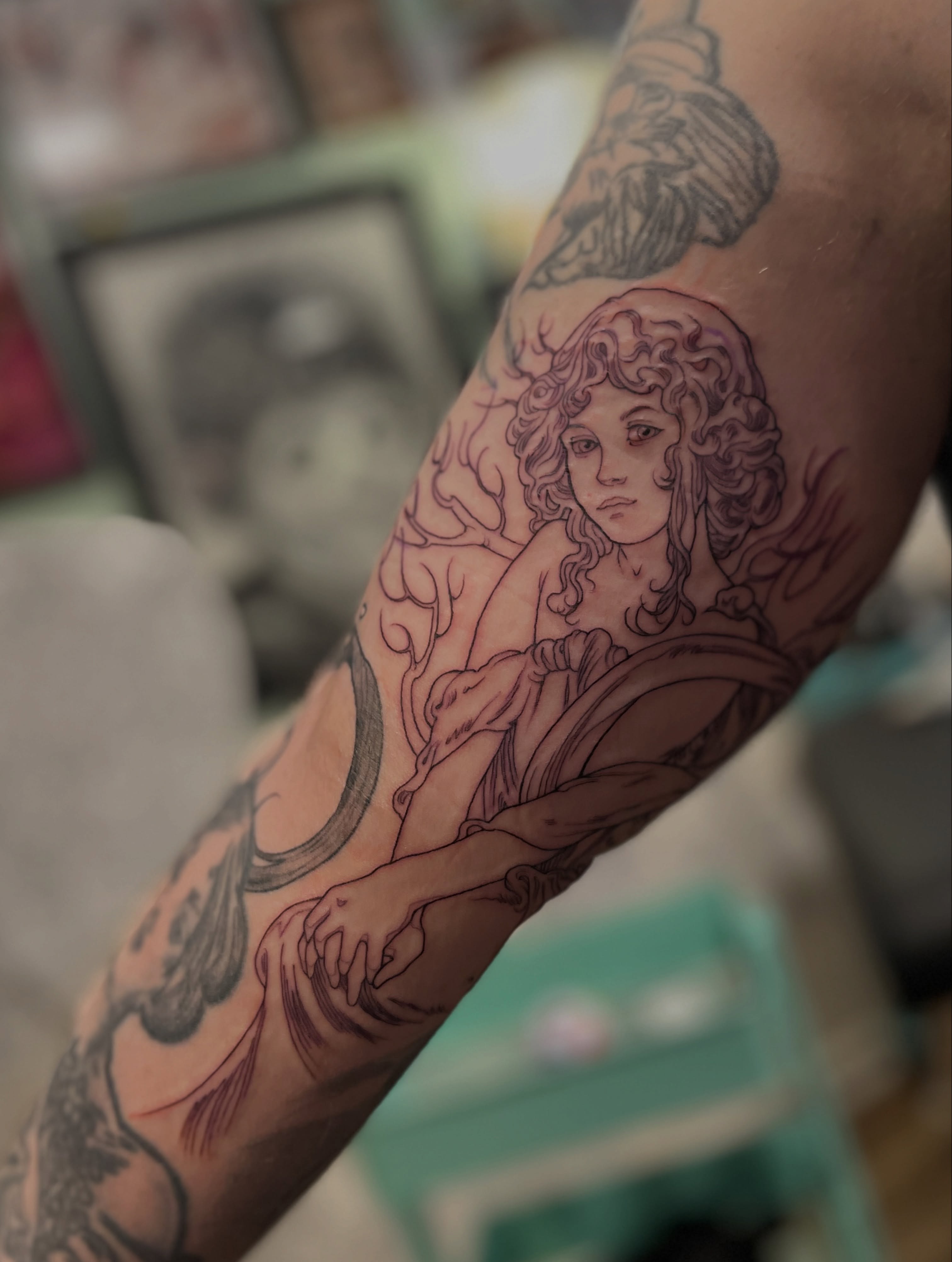 Woman with flowing hair black and grey tattoo on the forearm by BELLIE ✧ Tattoo Artist
