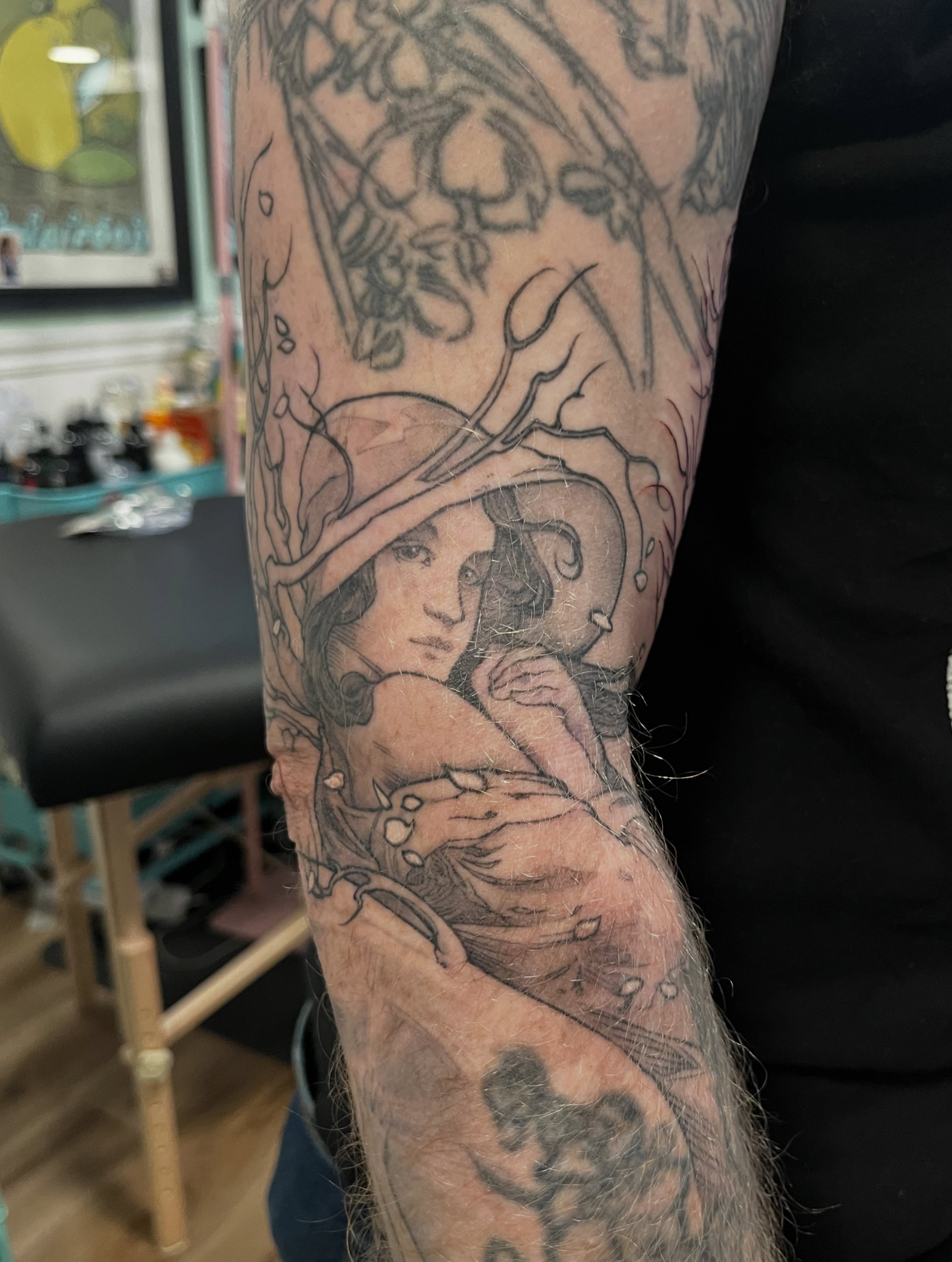 Woman with hat realism tattoo on the forearm by BELLIE ✧ Tattoo Artist