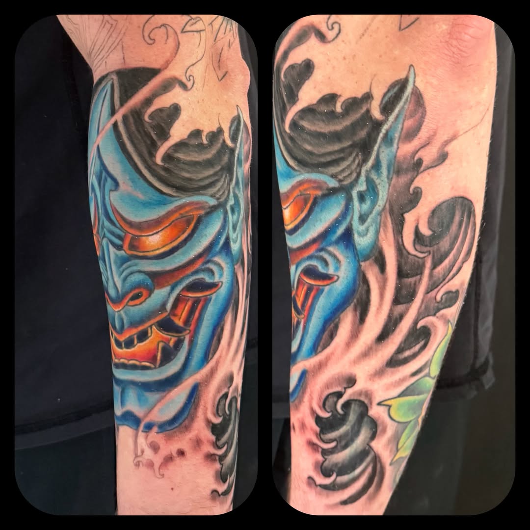 Demon mask japanese irezumi tattoo on the forearm by Patrick Cornolo
