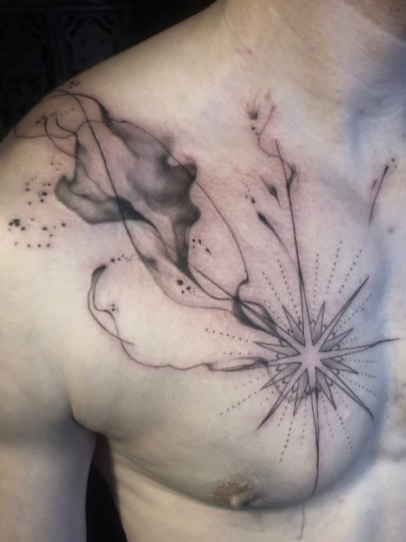 Abstract design dotwork tattoo on the chest by Cassandra Colleen