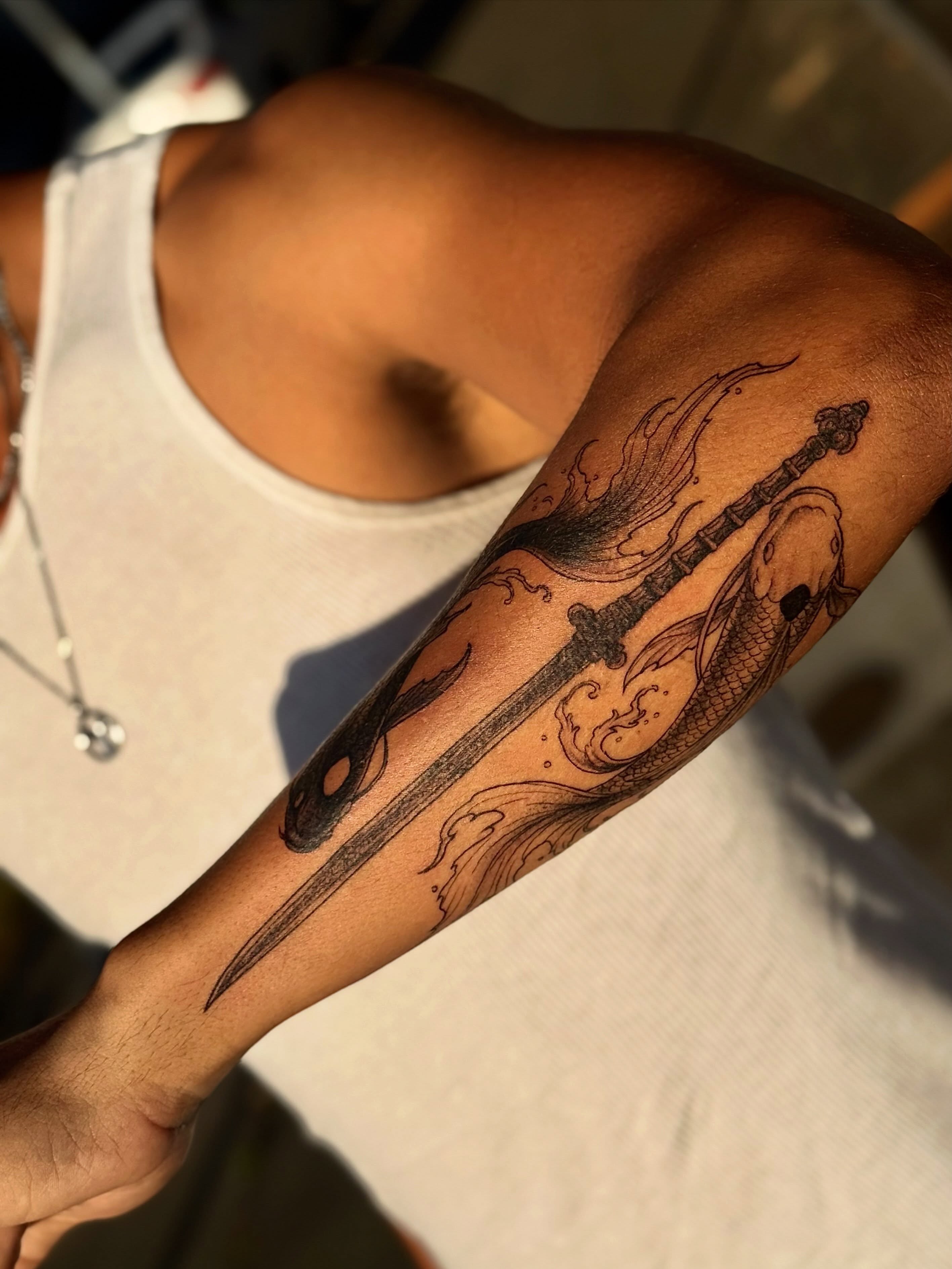 Sword and dragon black and grey tattoo on the forearm by MISO ⟡ Bay Area Tattoo Artist
