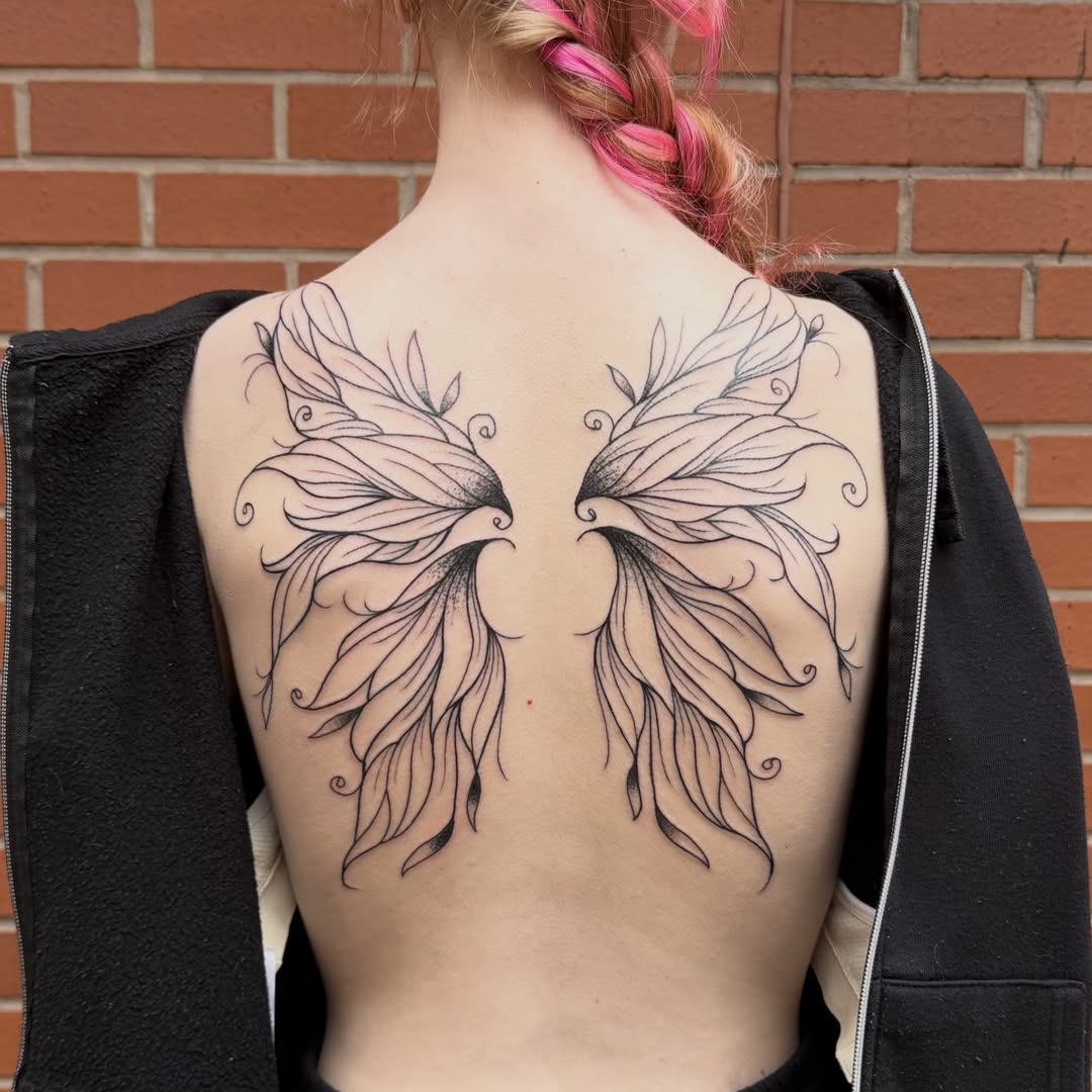 Wings dotwork tattoo on the back by Aiden Shaw