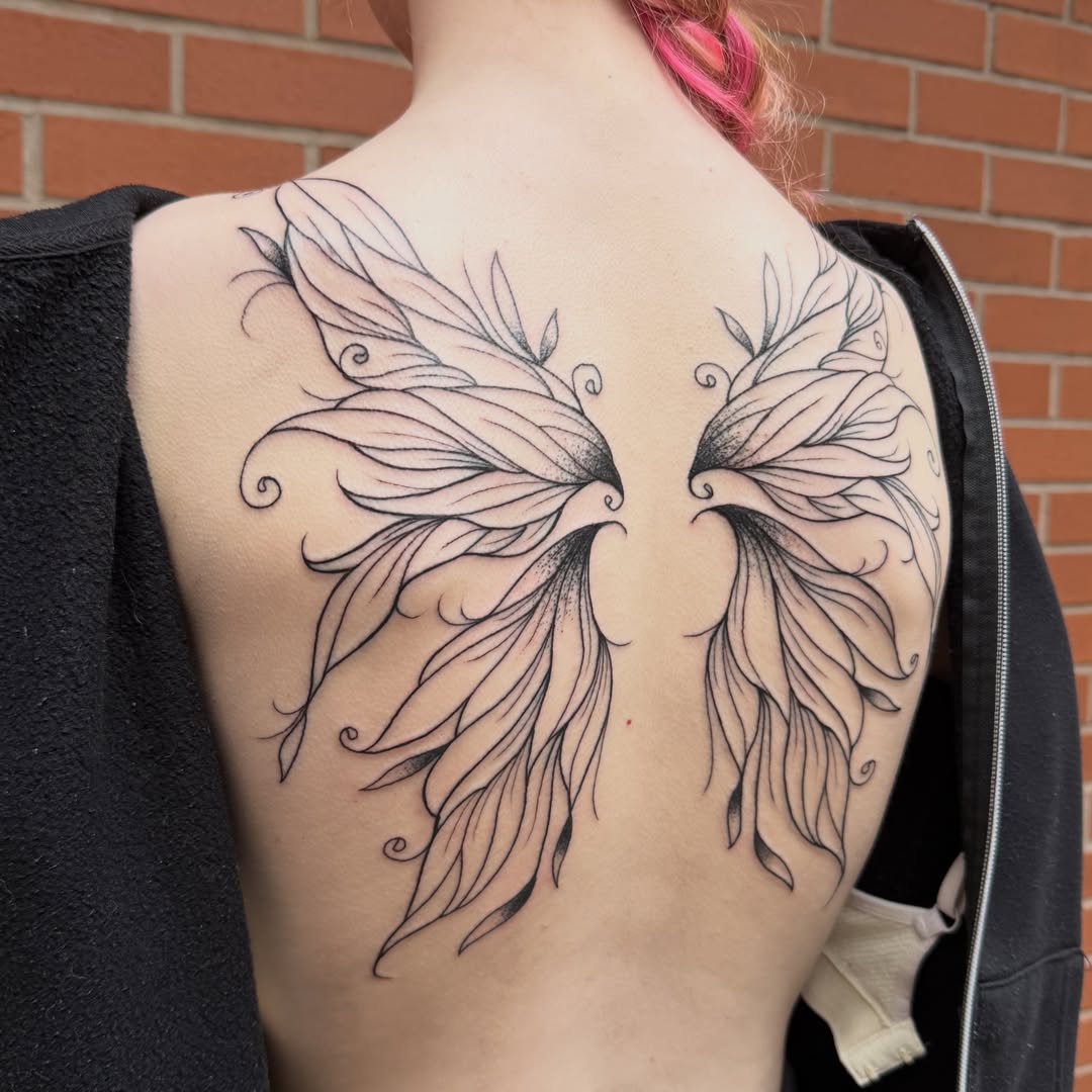 Wings dotwork tattoo on the shoulder by Aiden Shaw