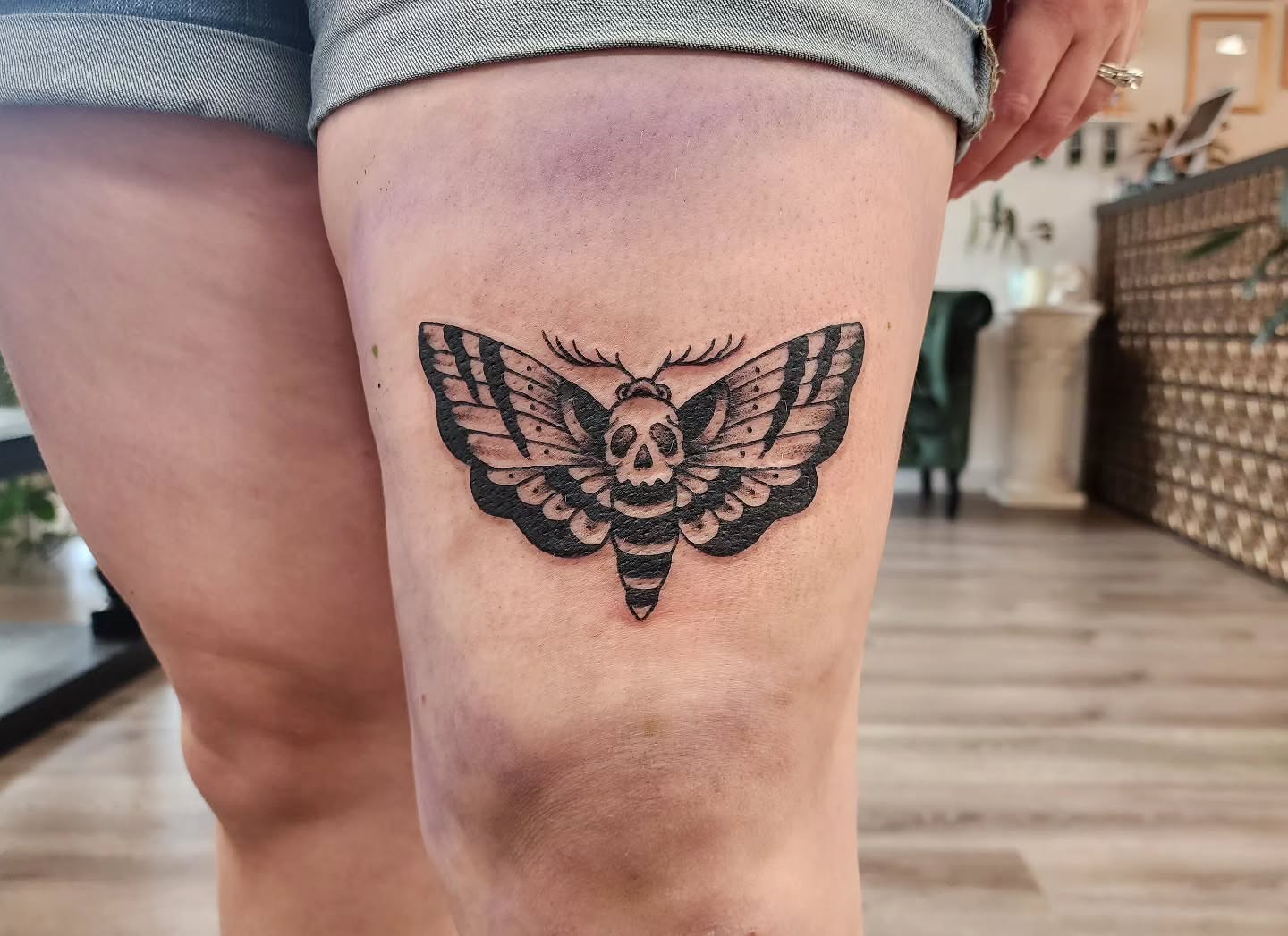 Death moth black and grey tattoo on the thigh by mikayla