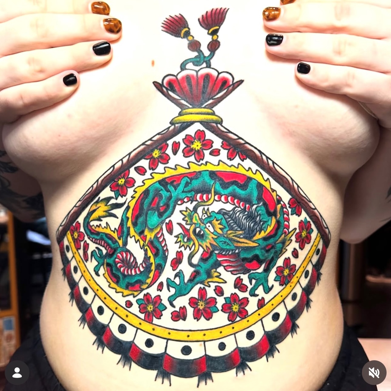 Dragon and floral mandala American traditional tattoo on the torso by Kiki Painmaker Trad Tattooer 🧨