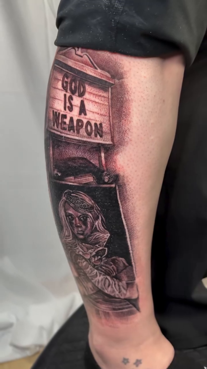 Woman with sign realism tattoo by Jared Soto
