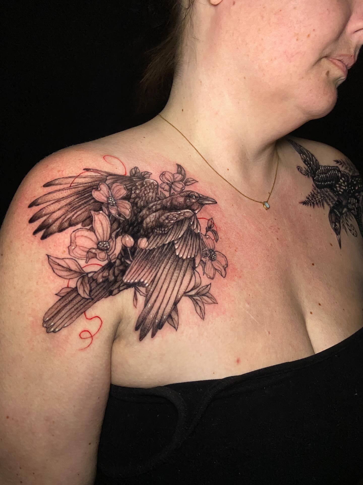 Crow and flowers realism tattoo on the shoulder by Dawn Carr, Richmond, Virginia