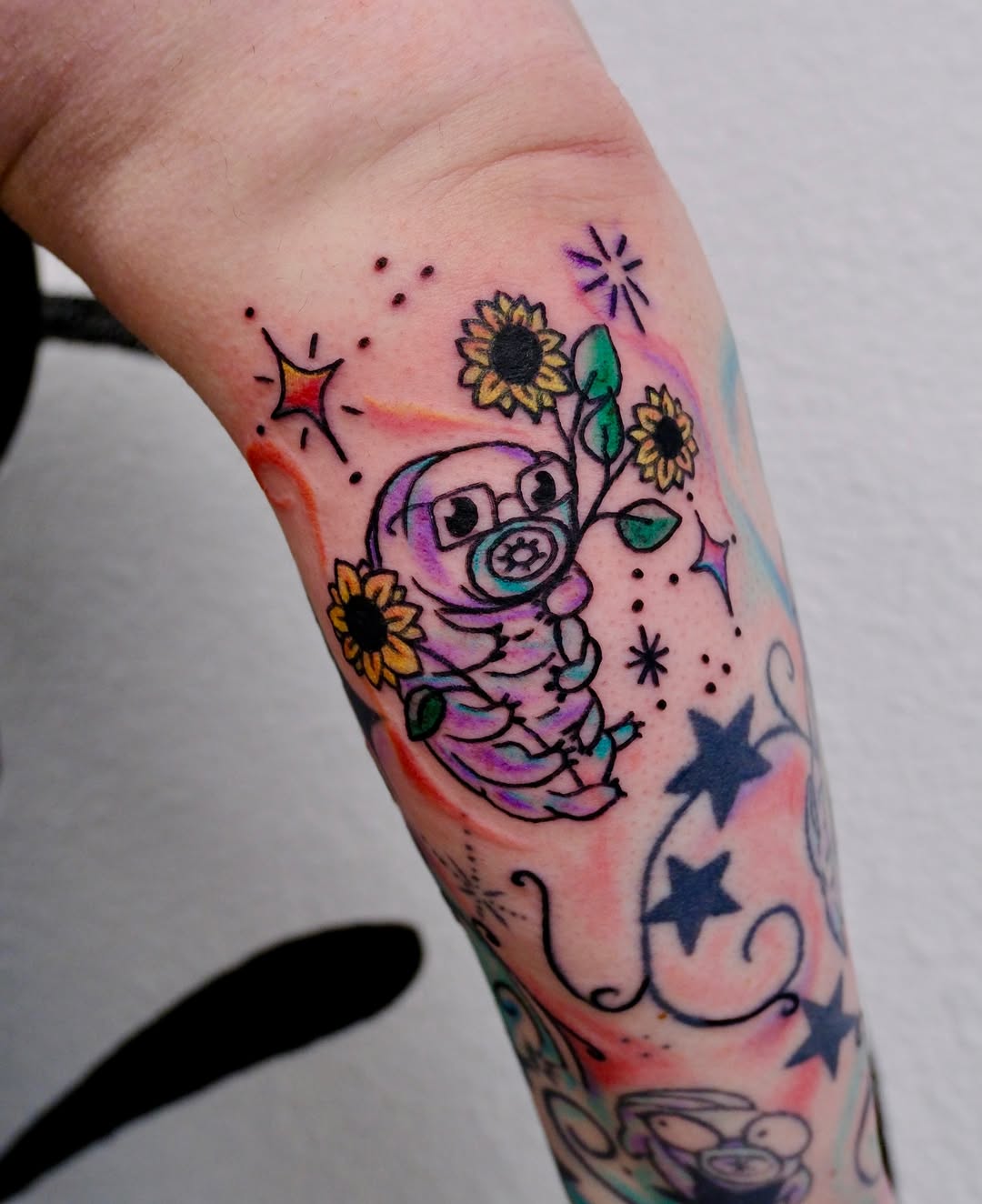 Pig with sunflowers dotwork tattoo on the forearm by Peggy