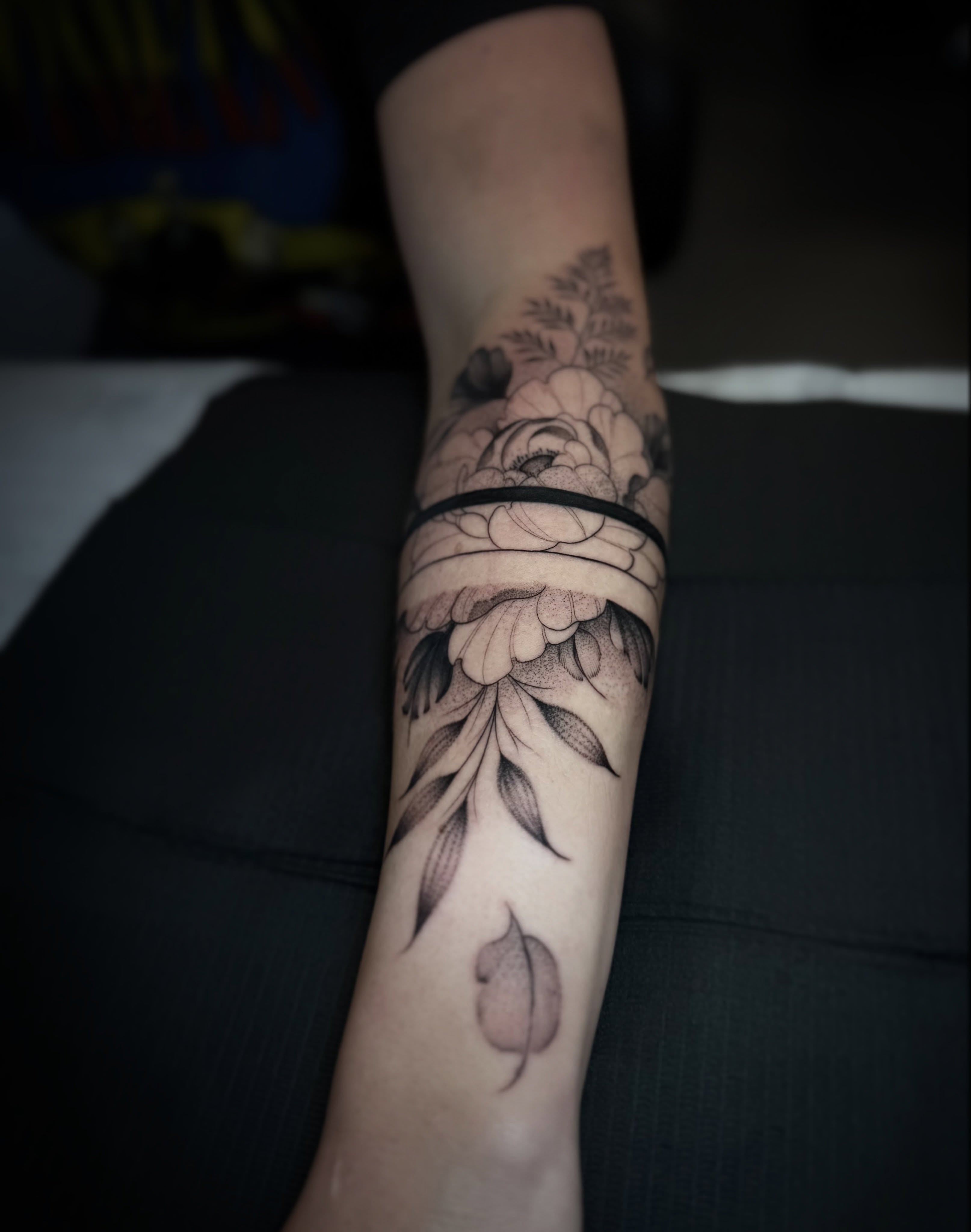 Peony flower black and grey tattoo on the forearm by Chloe
