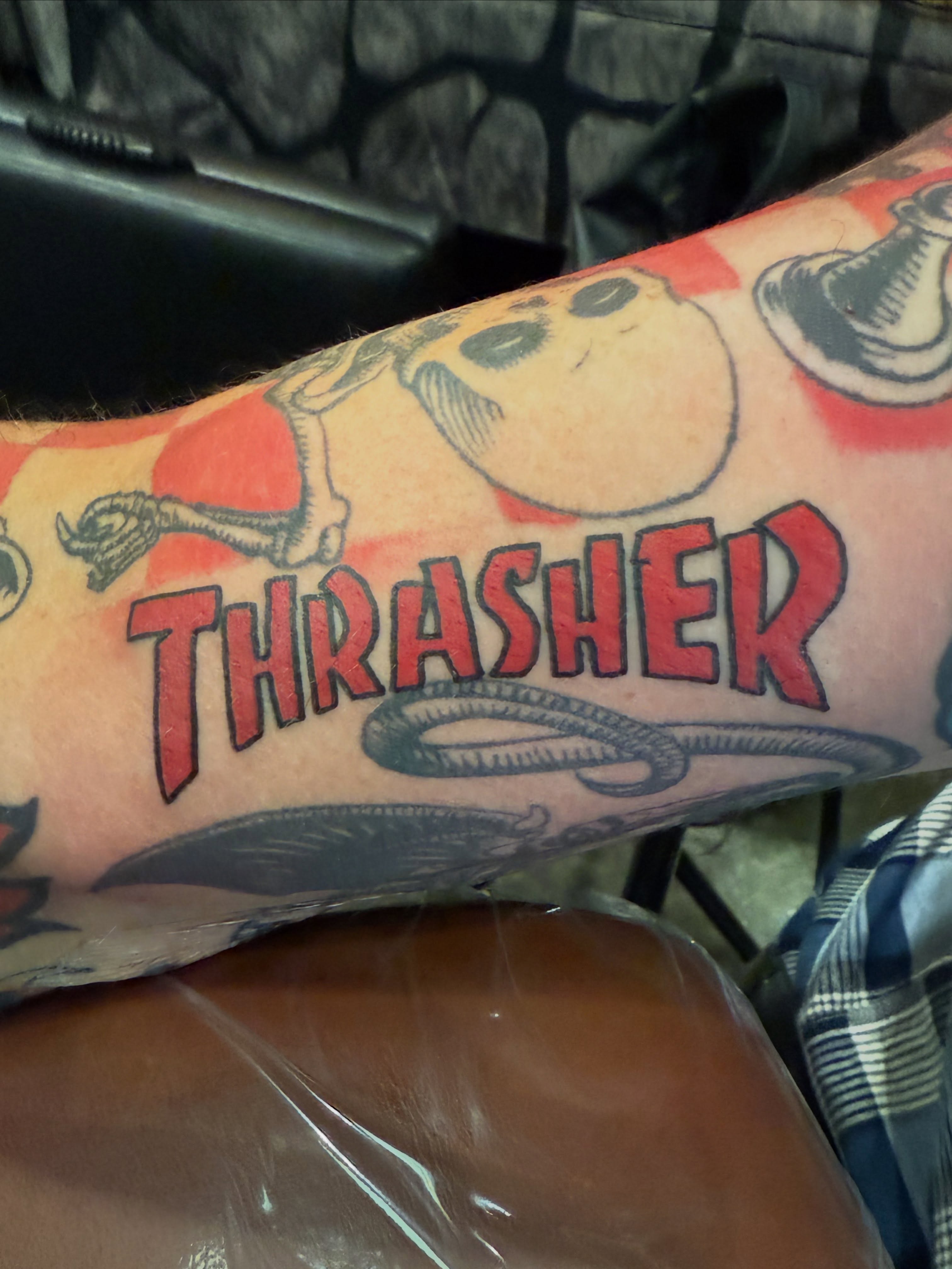 Thrasher magazine cover American traditional tattoo on the forearm by Emily Lestrange