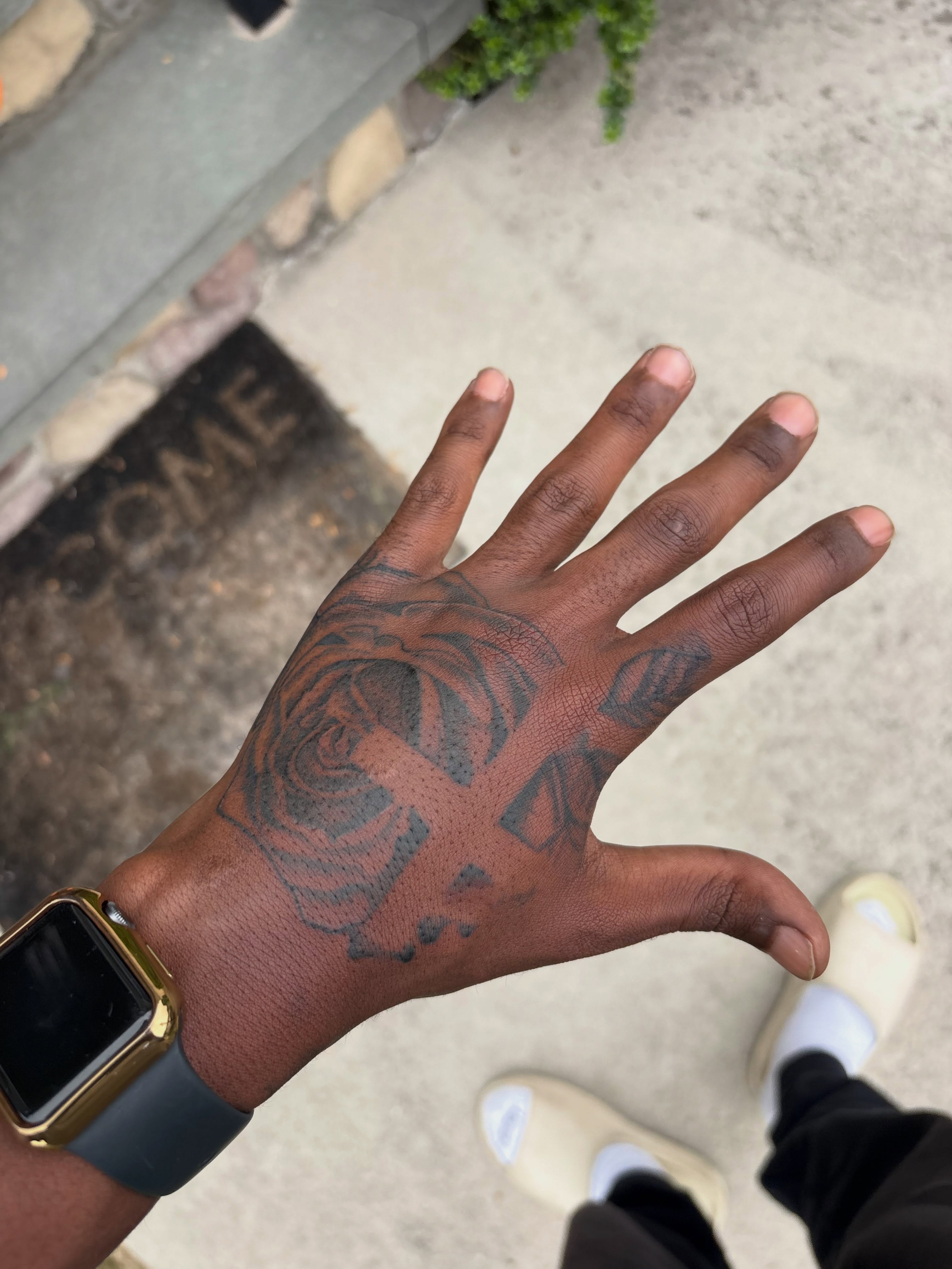 Rose American traditional tattoo on the hand by Destini