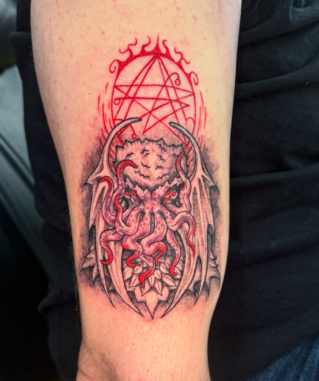 Cthulhu dark realism tattoo on the forearm by Tyla Pistak, Seattle, Washington